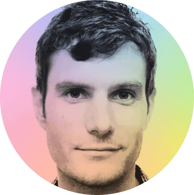 A young man with short dark hair, looking directly at the camera with a slight smile, against a colorful pastel gradient background.