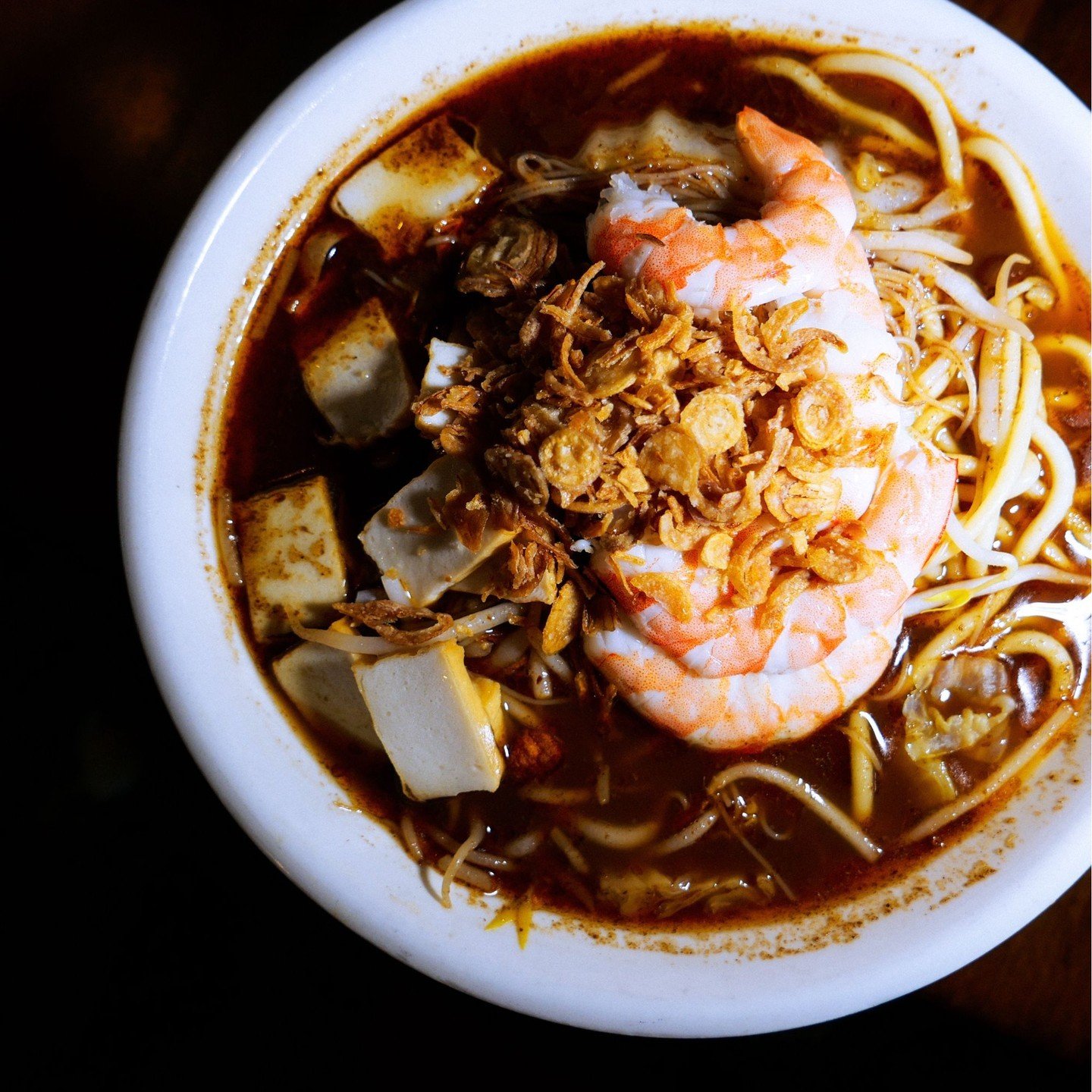 Prawn Noodle Soup - Intensely prawn-y broth served with your choice of noodles (yellow noodles, vermicelli, or a mix of broth) and topped with sliced prawns, fish cake, and fried shallots for a bit of crunch

(Available at both our locations)