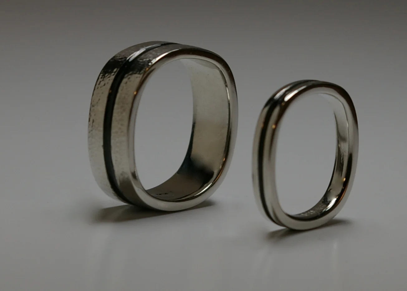 Platinum wedding bands black.jpg