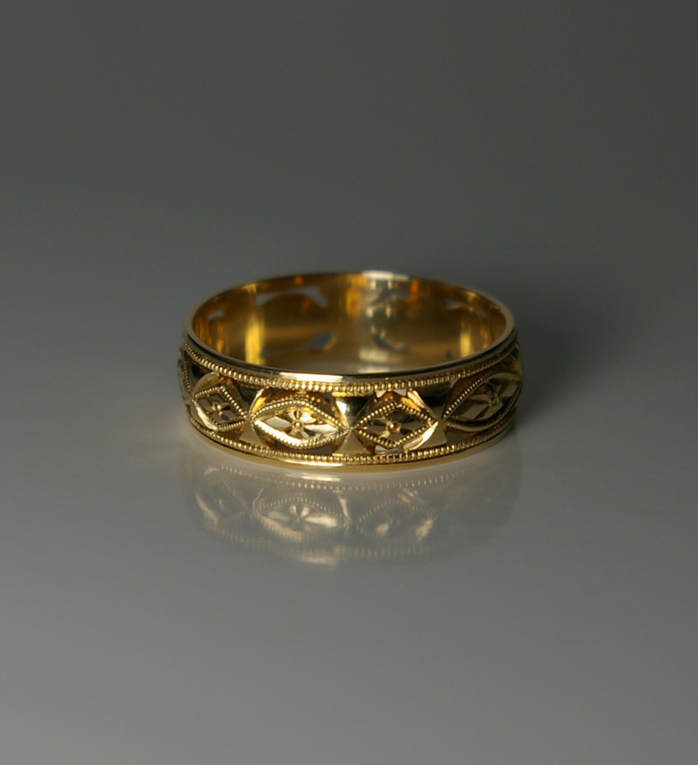 Carved wedding band.JPG