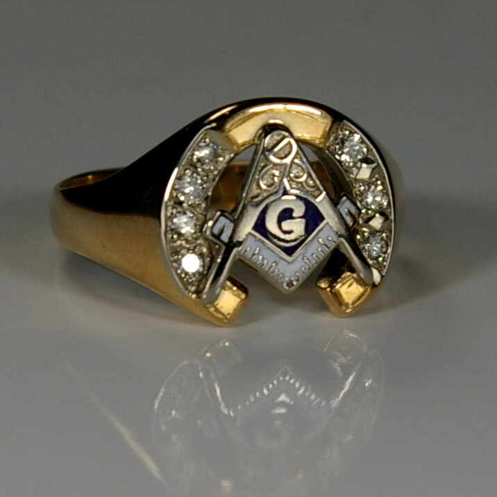 Masonic ring after restoration at Crane Jewelers Ltd. set with 7 diamonds.JPG