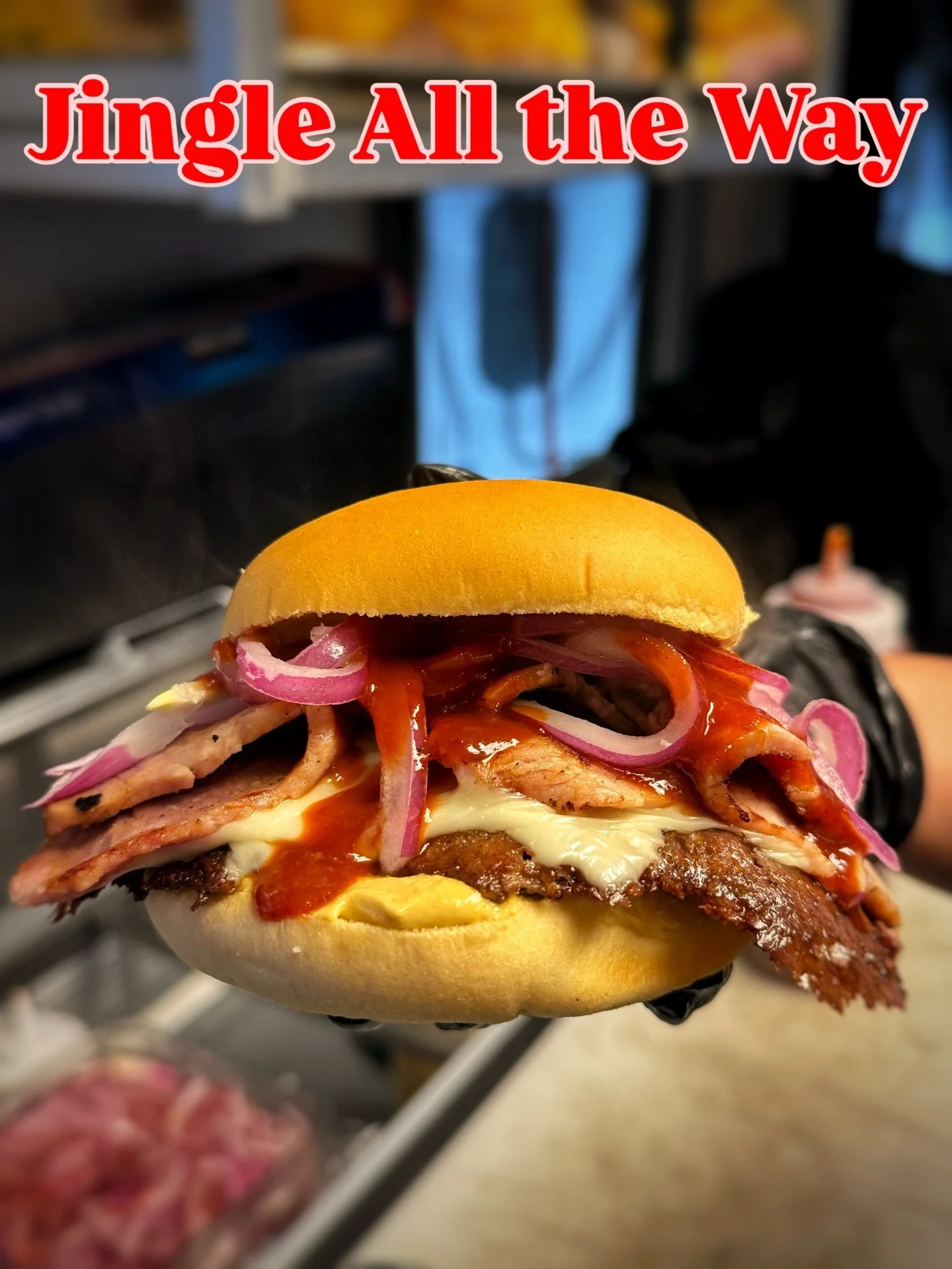 Jingle All the Way into 2026 with a burger special like no other from the best burger purveyor around.

Housed shaved Honey Ham, Pickled Red Onion, Smash Patty with Melted Swiss American, Jingle Dazzle Sauce, piled on top a bed of Dijon Mustard. All 