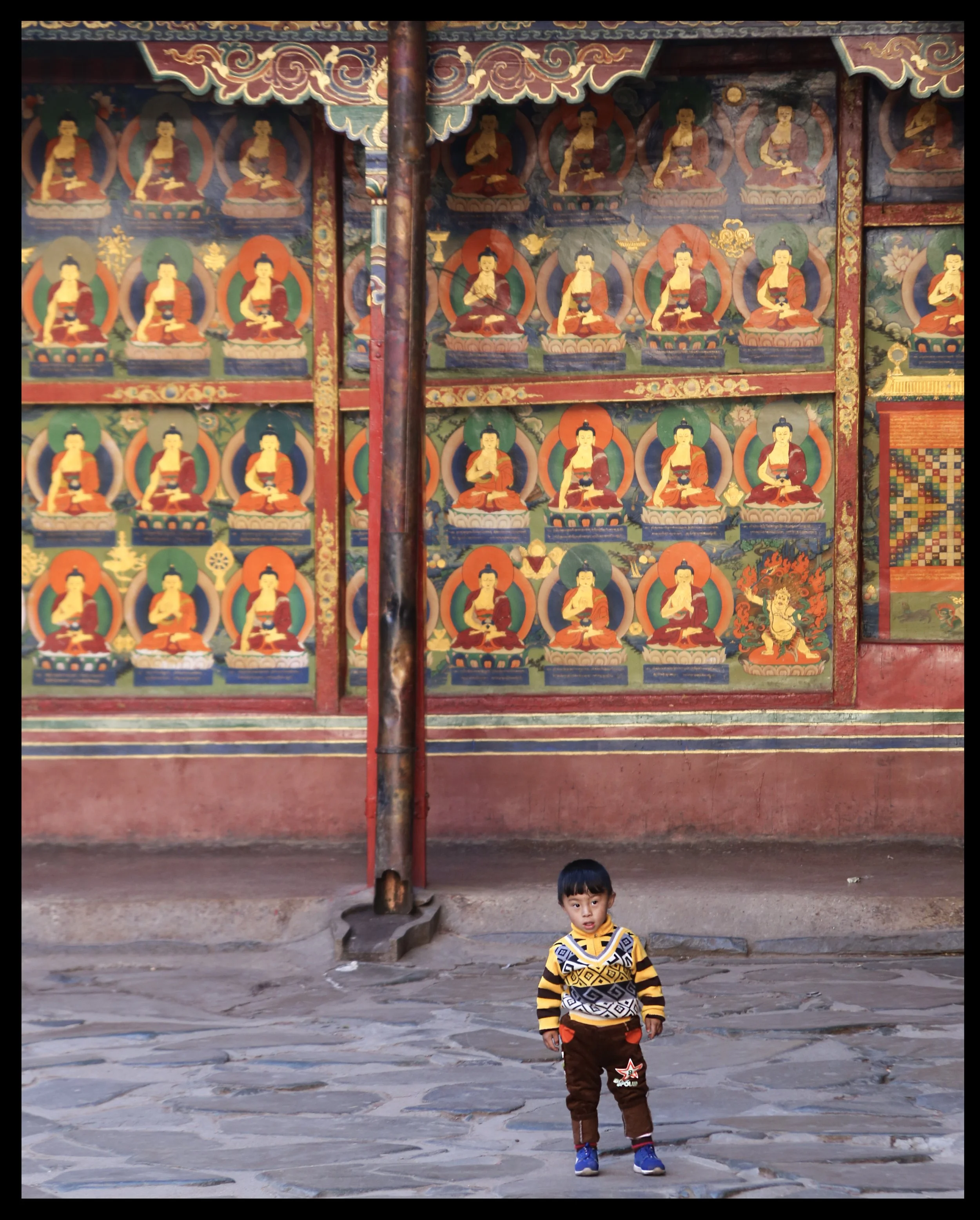 blog - little boy in temple.jpg