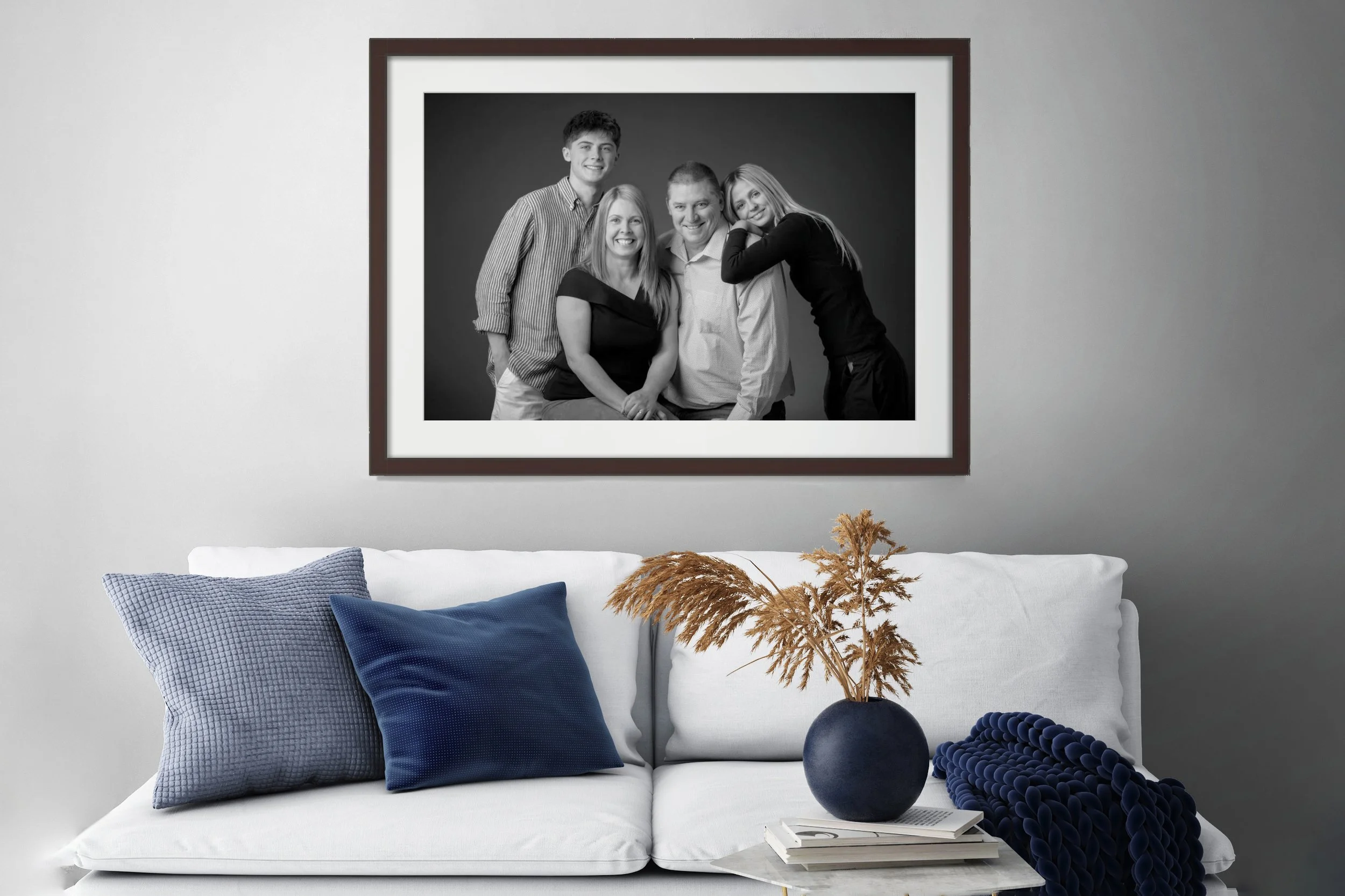 BW Studio Family Portrait over casual couch