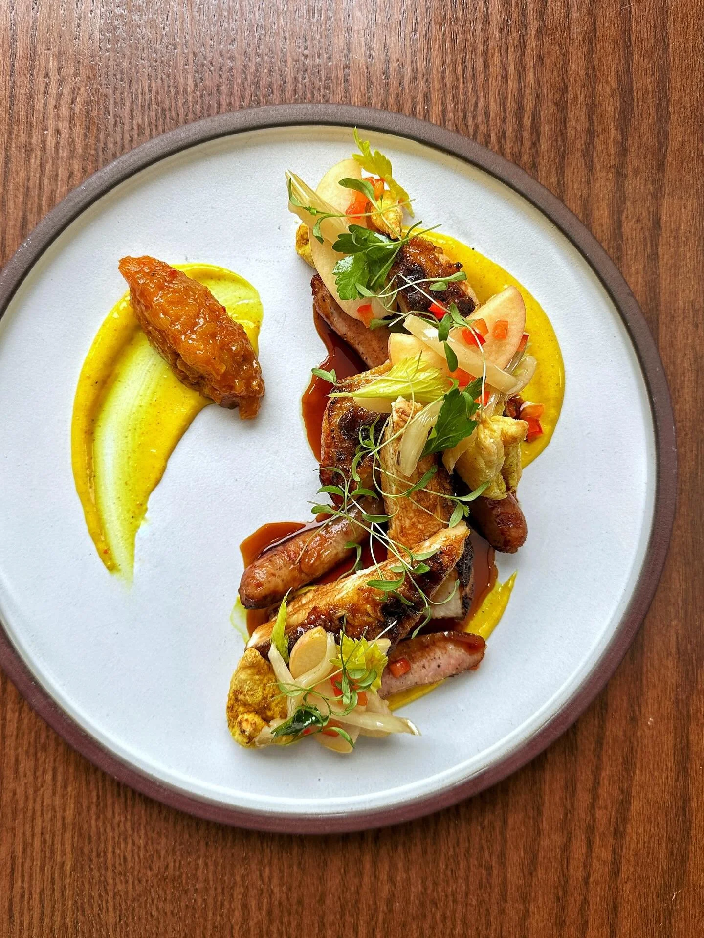 Spice Crusted, Double Alberta Chicken Breast, Chicken Sausage, Apricot Chutney, Vadouvan Aioli, Demi-Glac&eacute;, Puff Pastry, Preserved Apple, Roasted Fennel, Celery Leaves and Micro Cilantro

🌿✨🌶️👑🍋🇬🇧🐔🍽️

 Coronation Chicken, now on the me