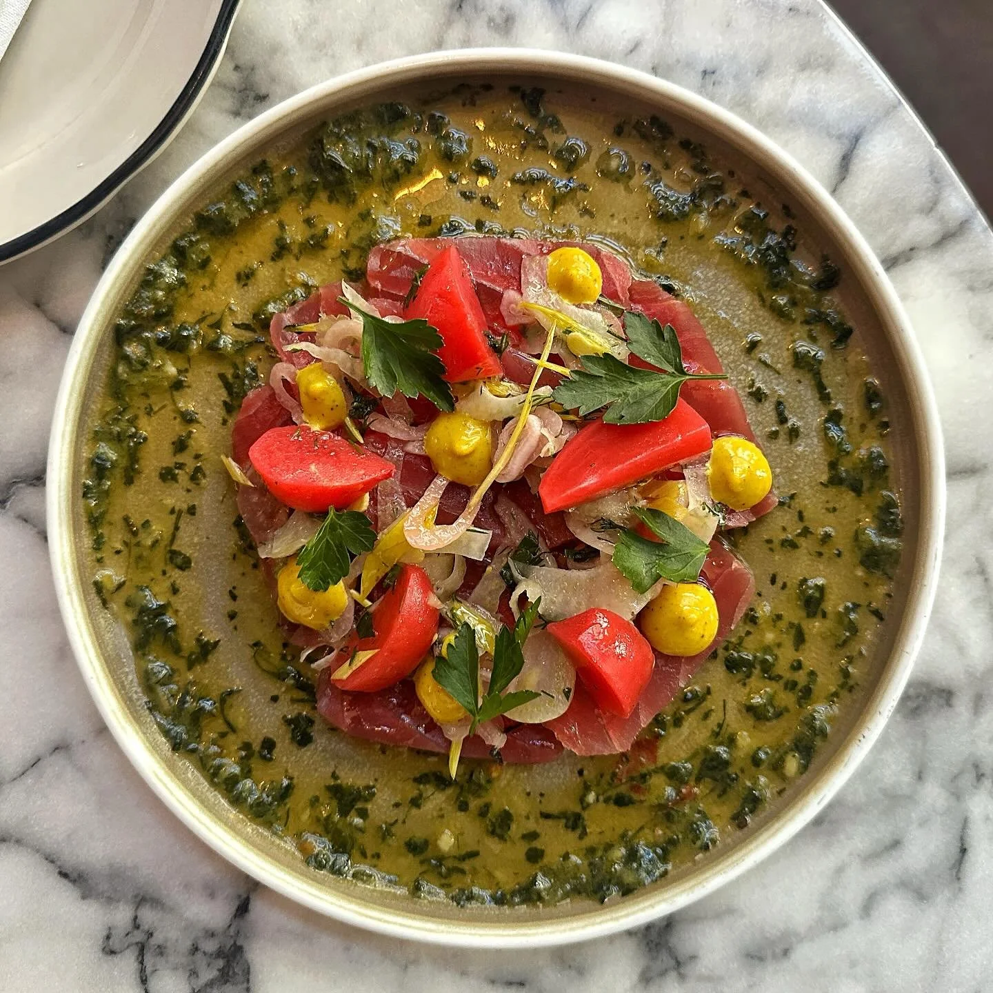 Citrus Cured Yellowfin Tuna, Mint &amp; Fenugreek Chermoula, Vadouvan Aioli, Shaved Fennel, Pickled Shallots &amp; Radish, Popcorn Shoots, Mint, Dill and Flat Leaf Parsley 

🌿 🍽️🌶️🍋🐟✨

@patandbettys