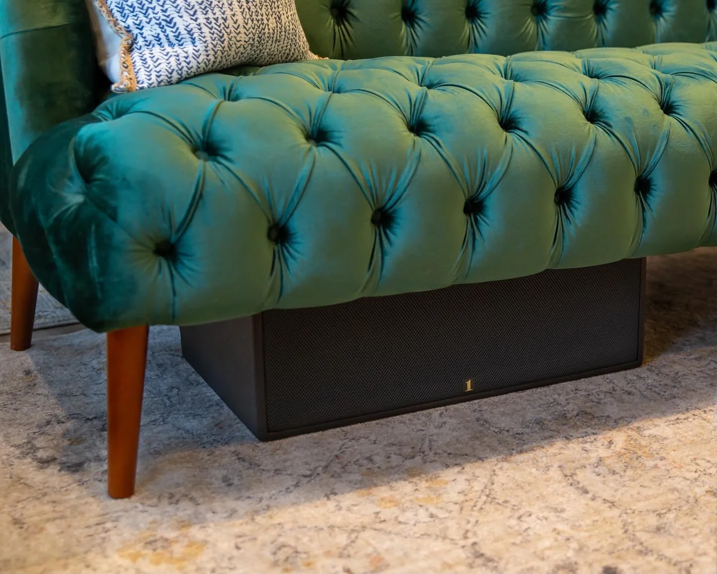 A subwoofer designed to disappear&mdash;yet leaves a big impact.

The SUB28 is a compact subwoofer standing at just 7.95&rdquo; tall &mdash; designed to slide under couches, inside banquettes, or tuck neatly into furniture without losing power.

Insi