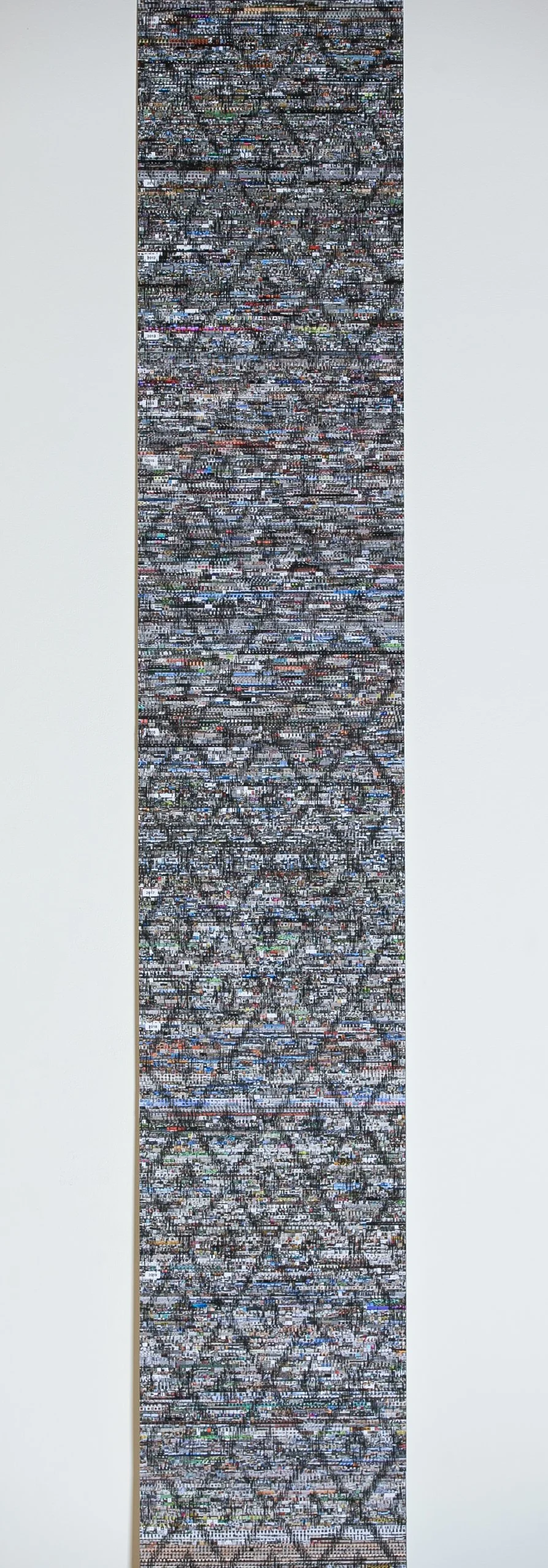  The years indicated along the left side provide a rough index to the color fields formed by the tiny images, allowing me to remember what was happening in my life at that time. 