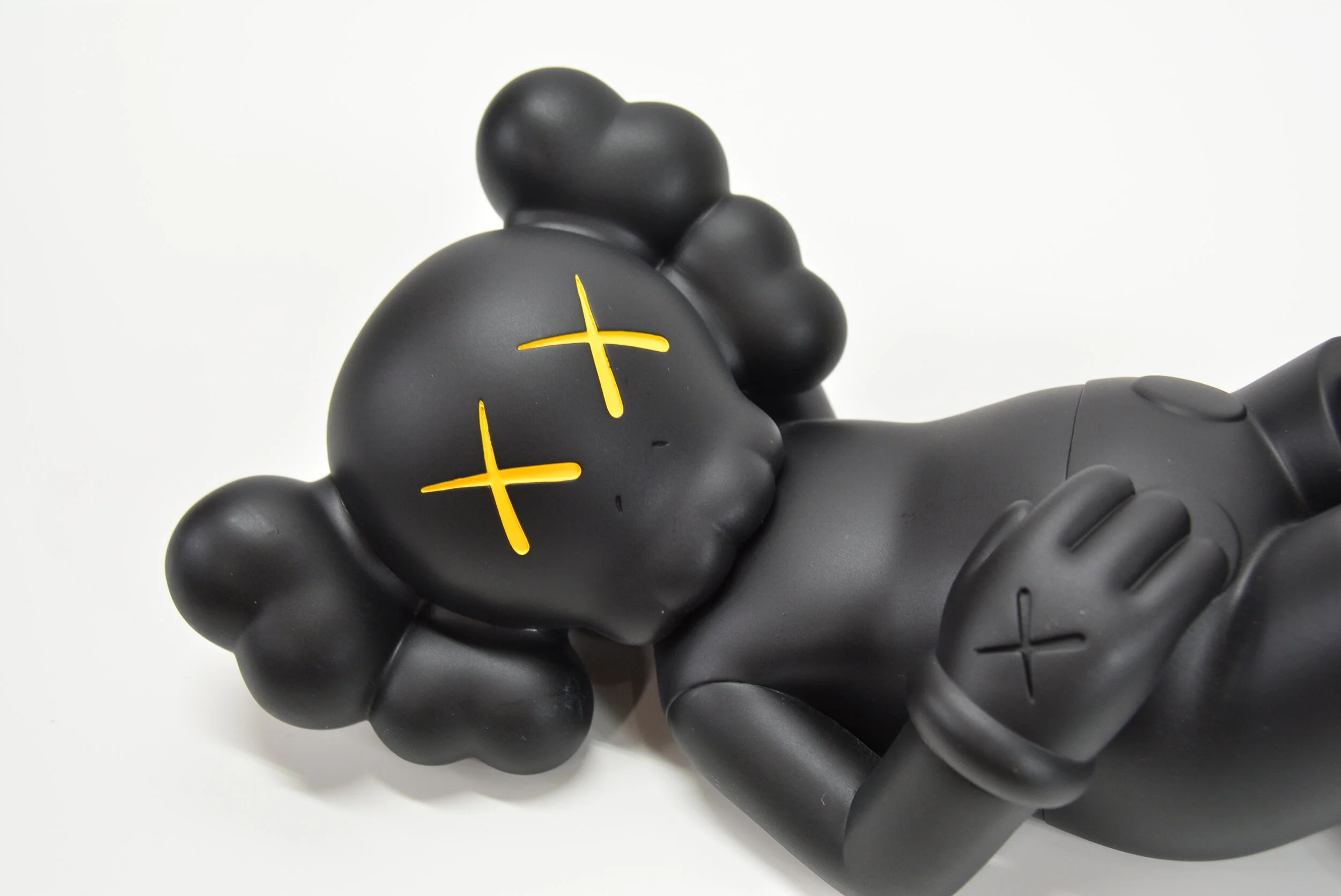 KAWS HOLIDAY JAPAN VINYL FIGURE (BLACK) — STANDARD X FUTURE