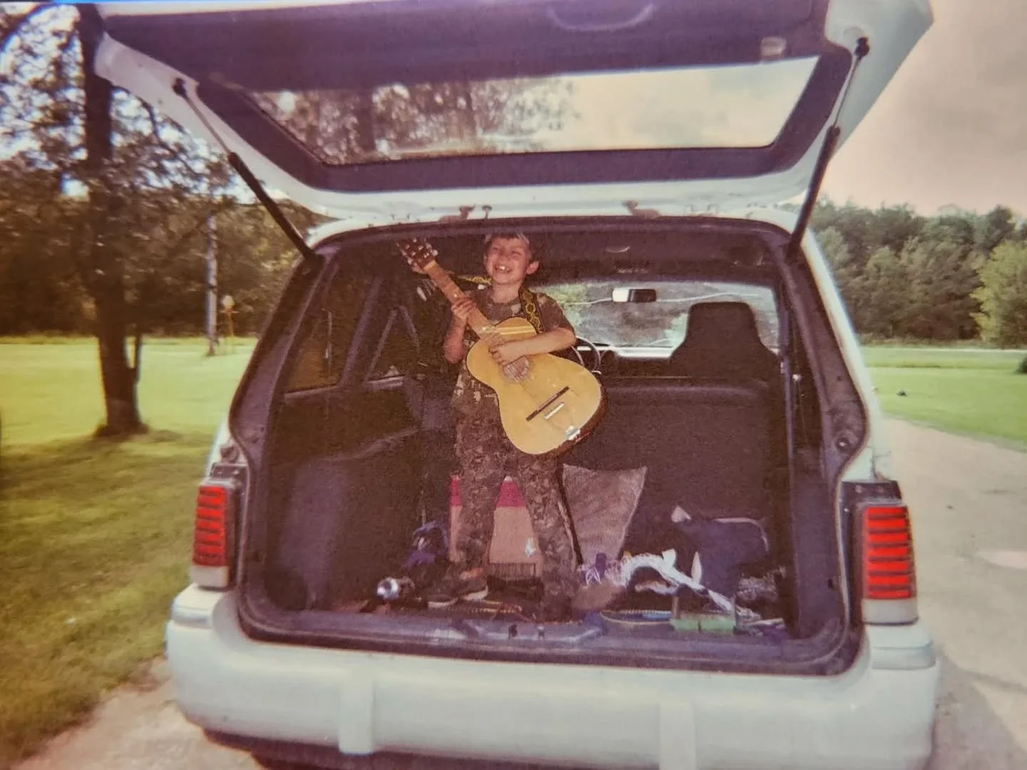 Today I turned 10,000 days old. No one really celebrates stuff like this. But I've been keeping track since I was a kid. It's hard to put life into a few pictures, but here's a few favorites 

1. My first guitar. My first show. 7 years old in the bac