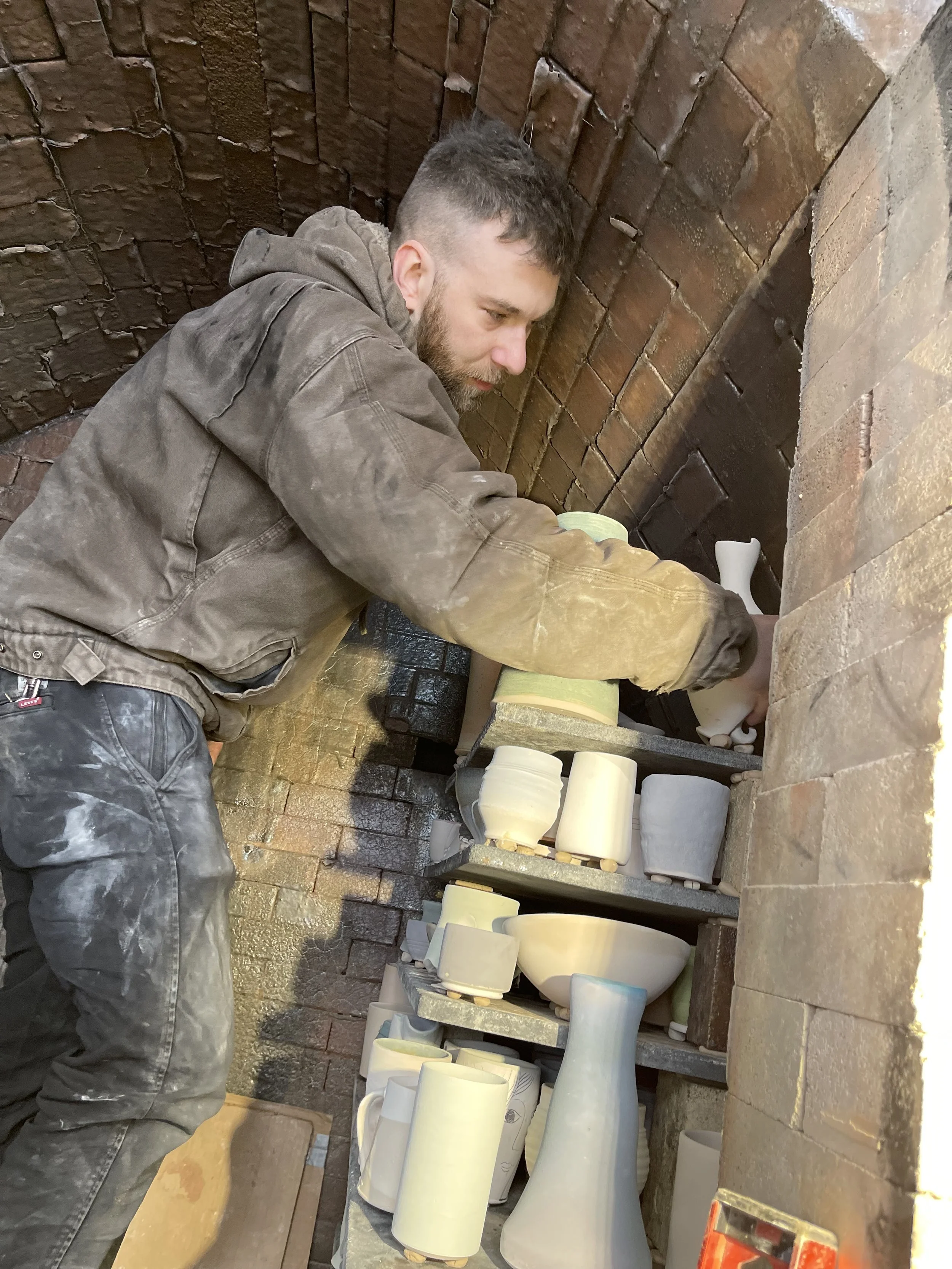 Samuel Newman in kiln.jpeg
