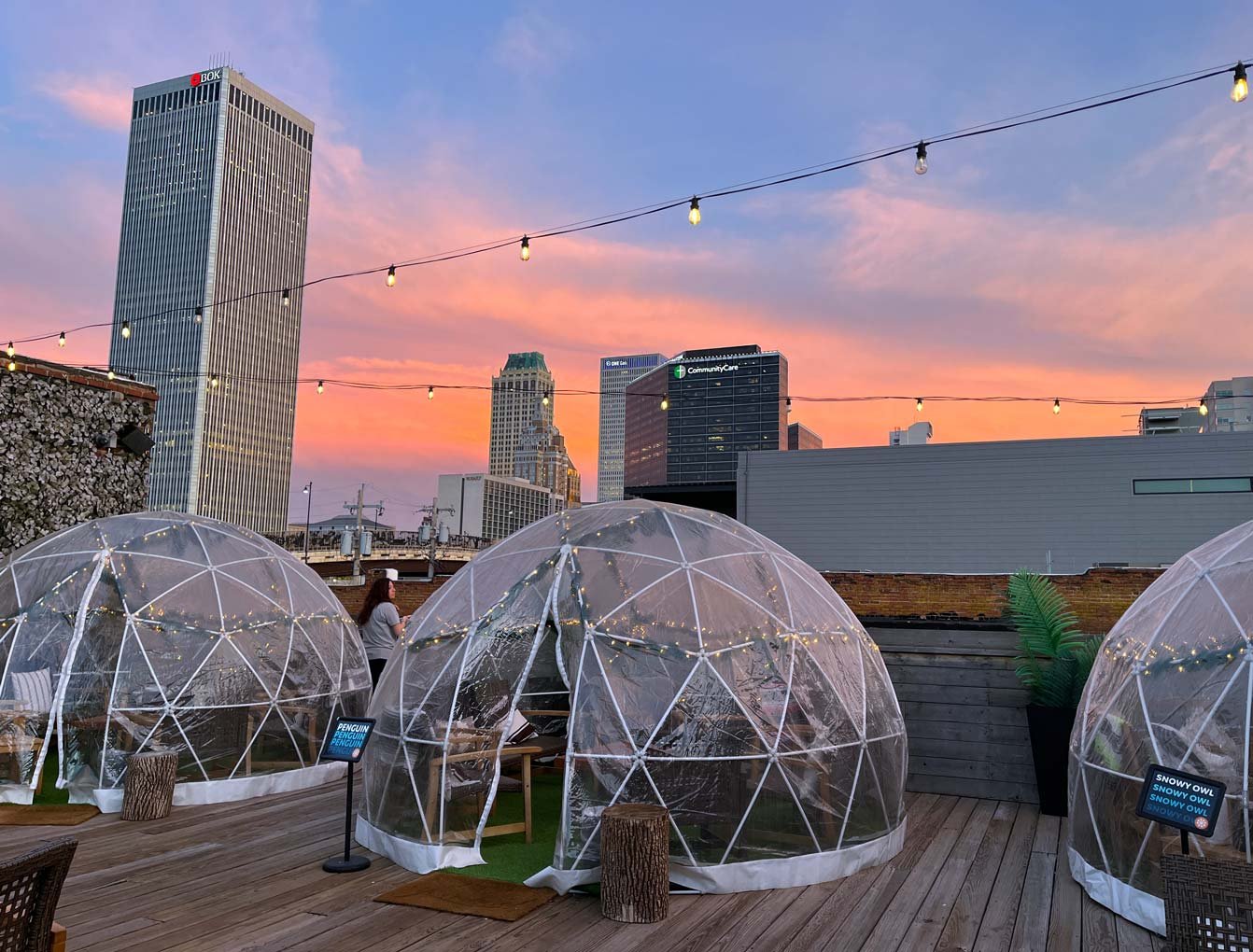 Tulsa skyline from Welltown brewery rooftop with igloos