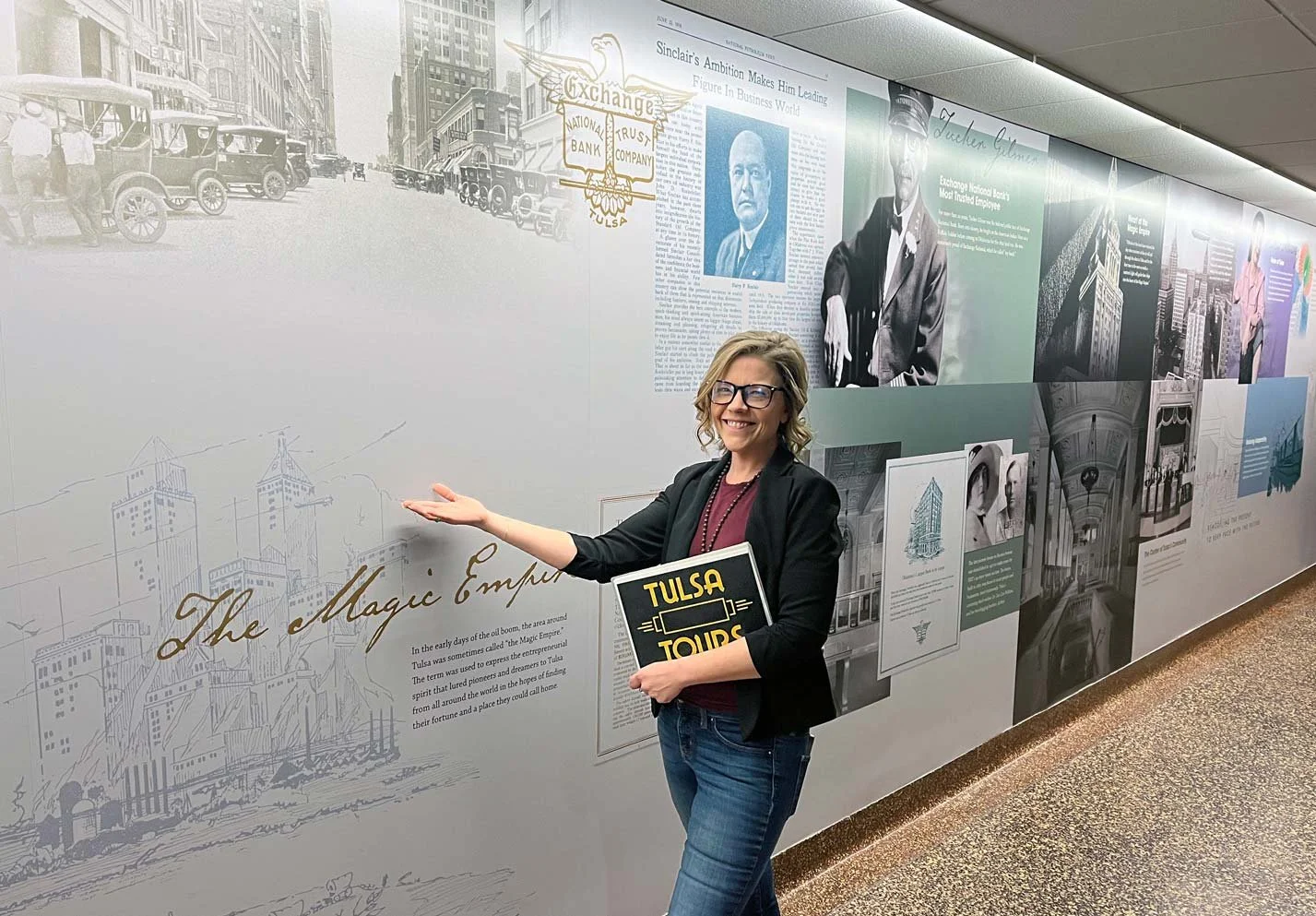 Tulsa tunnel with historic display on the wall.