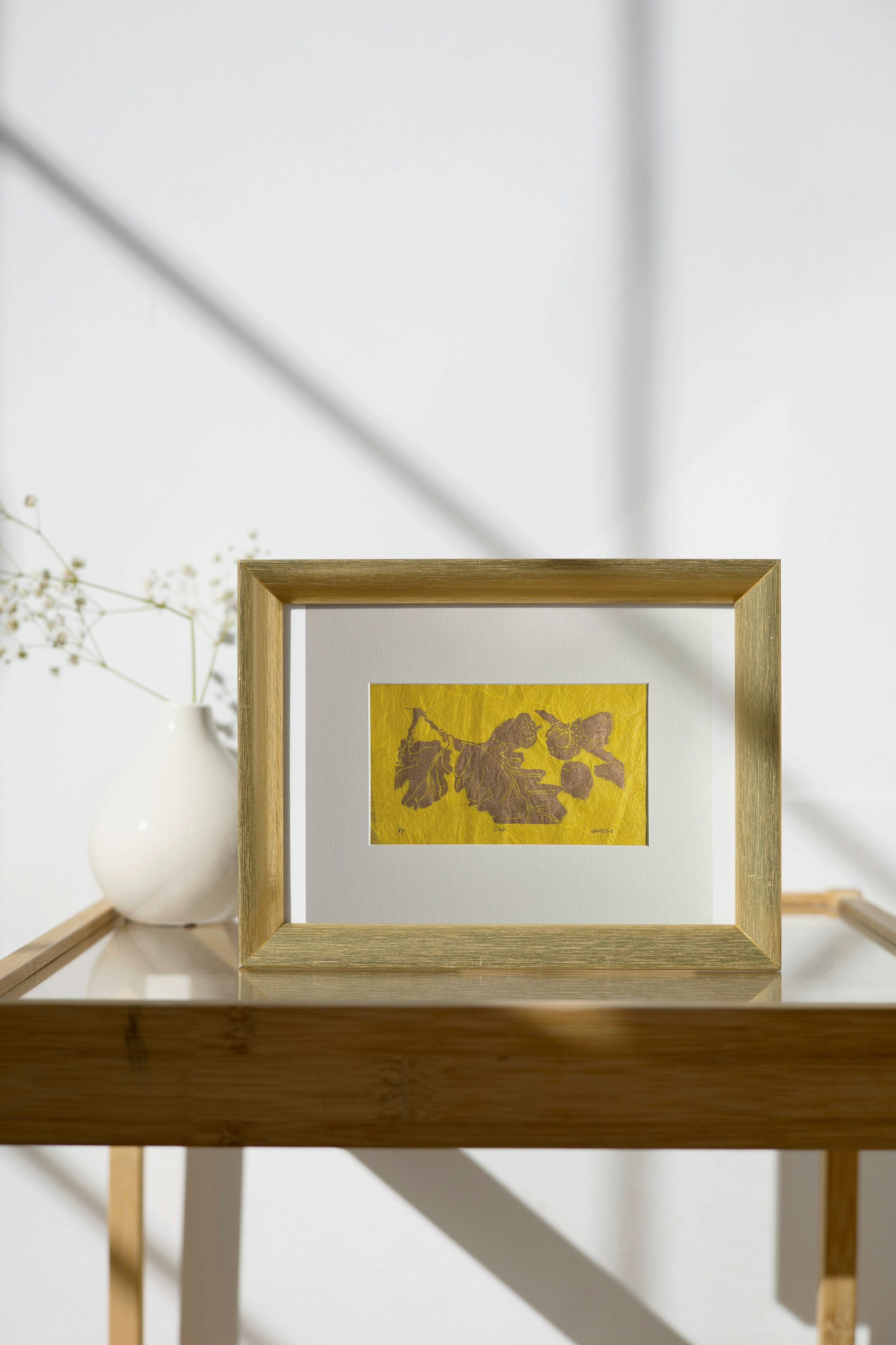 Oak Metallic Linocut on Yellow on Metal Frame on Side Table.png