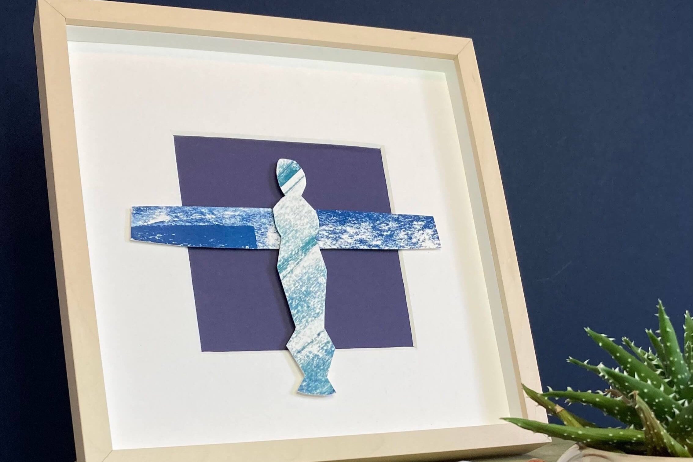 Framed Angel of the North Collage front view on wooden shelf