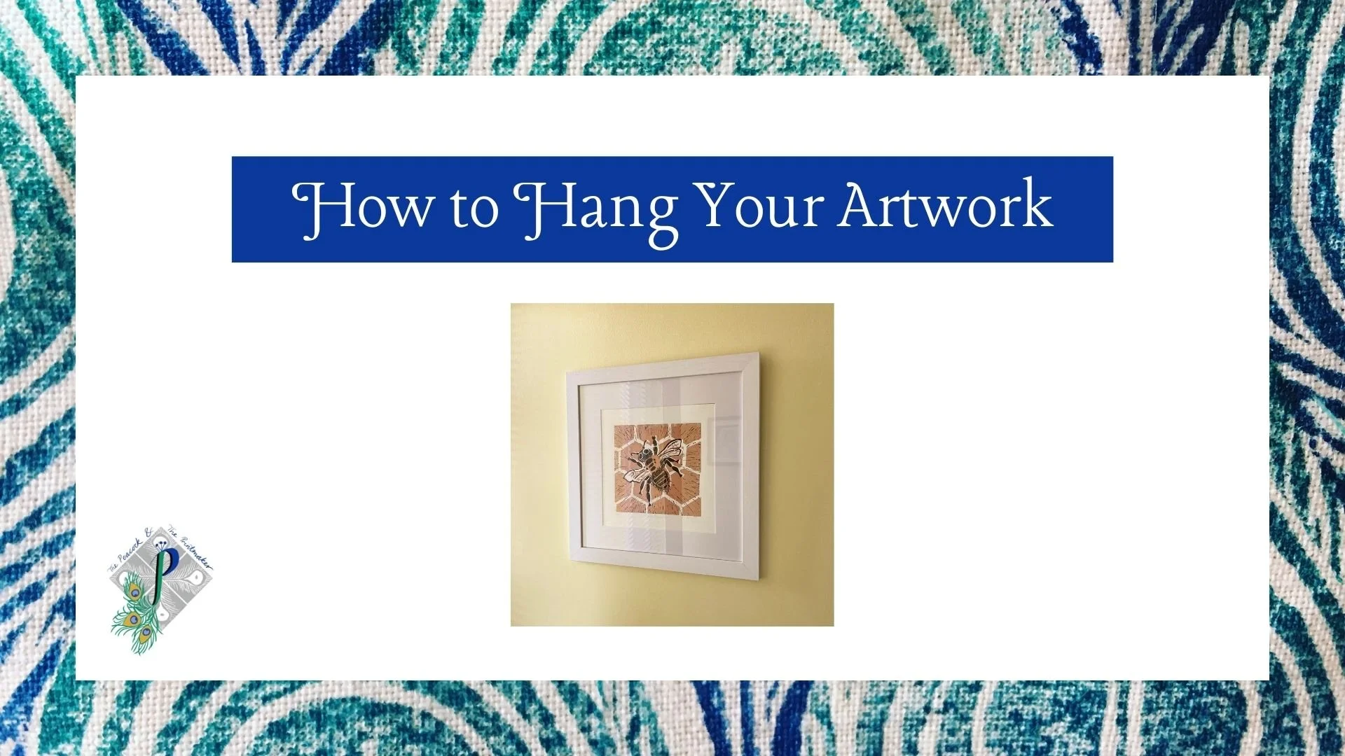 Front cover of the How to Hang Your Artwork guide - showing a piece of artwork that has been expertly hung on a yellow wall. This image is on a white background and surrounded by peacock print.