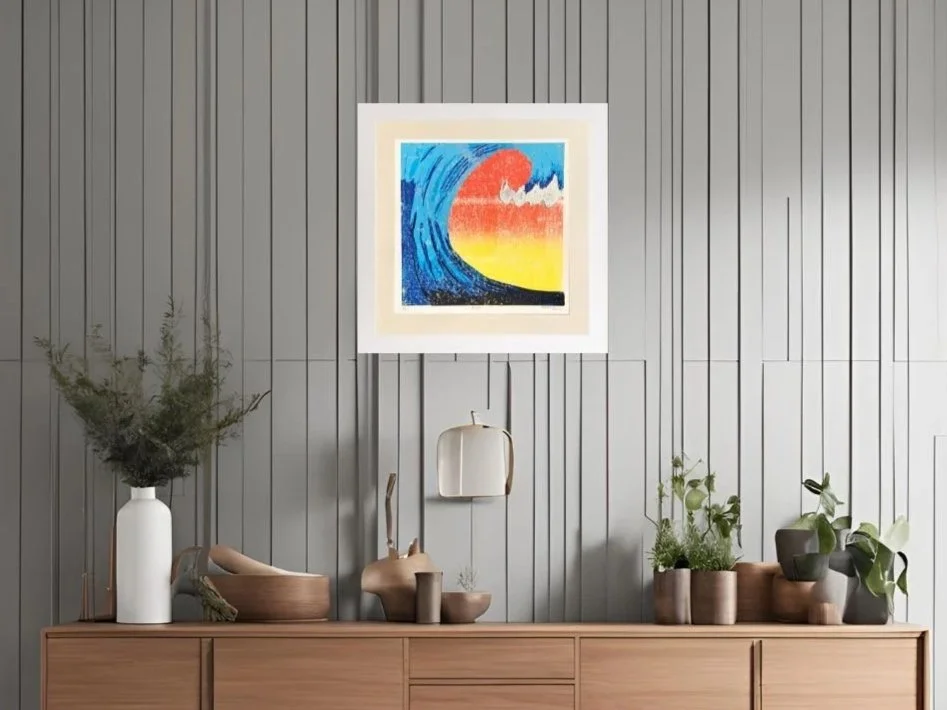 ‘Rush’ Hand Printed Lino Reduction Print of a Vivid Blue Wave Curling Over In Front of a Tangerine and Lemon Yellow Sunrise, Inspired by The North East Coast of England