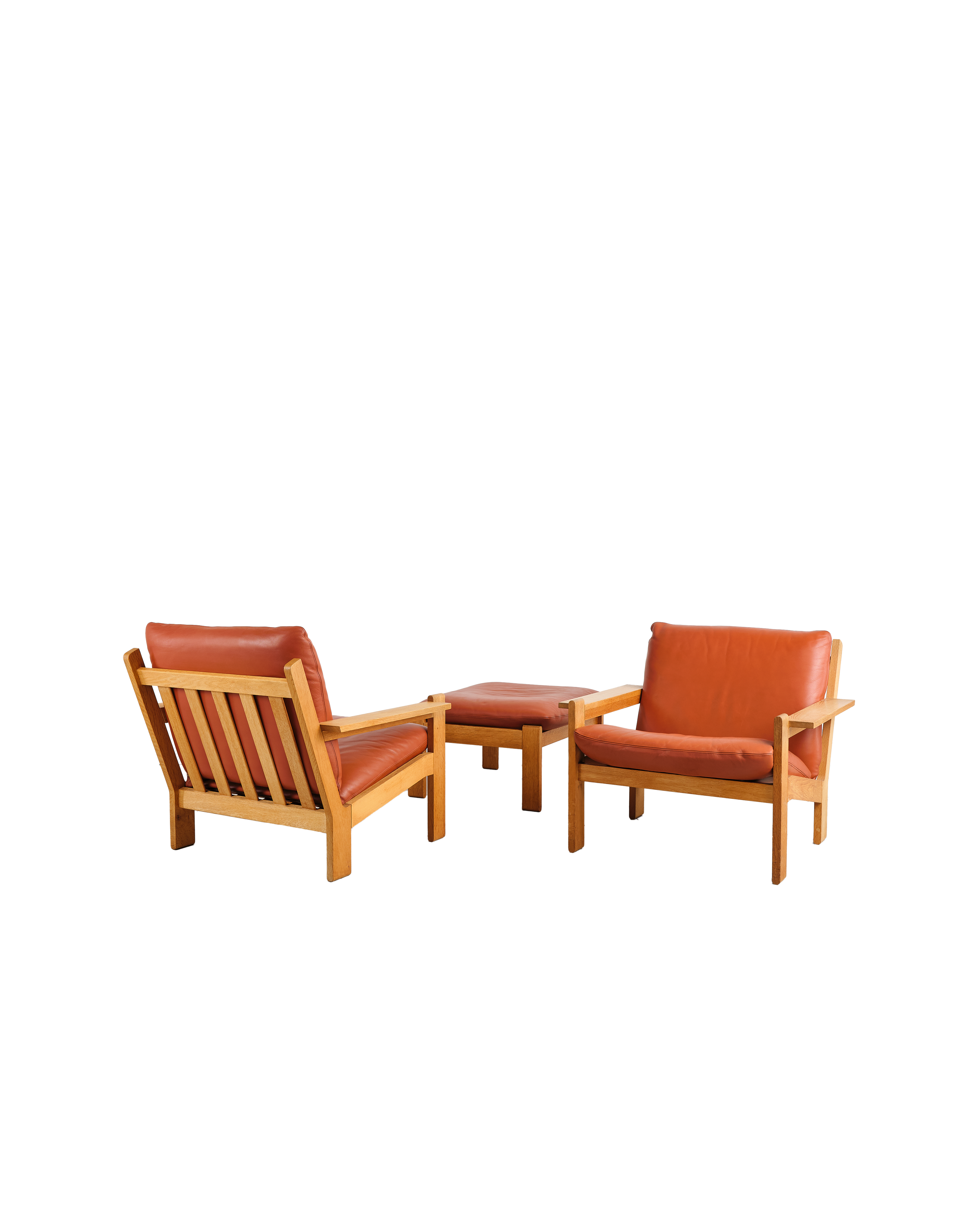 Tage-Poulsen-lounge-chairs-set-ottoman-mid-century-modern-furniture-mucmodern-1.png