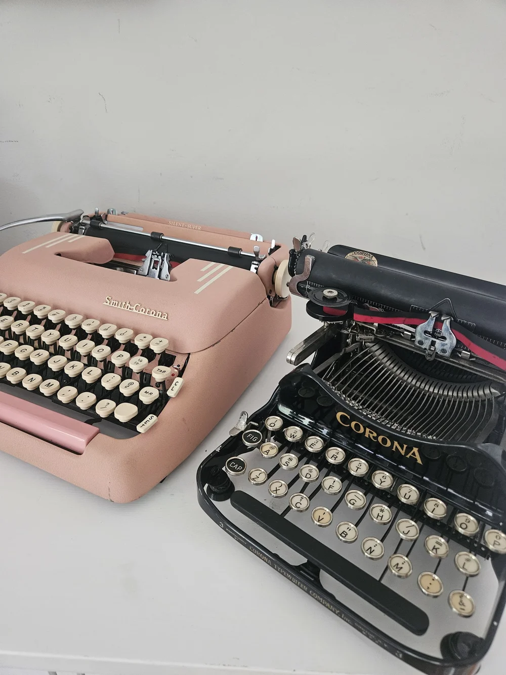 Circa 1955 Smith Corona Silent Super pink typewriter with Holiday