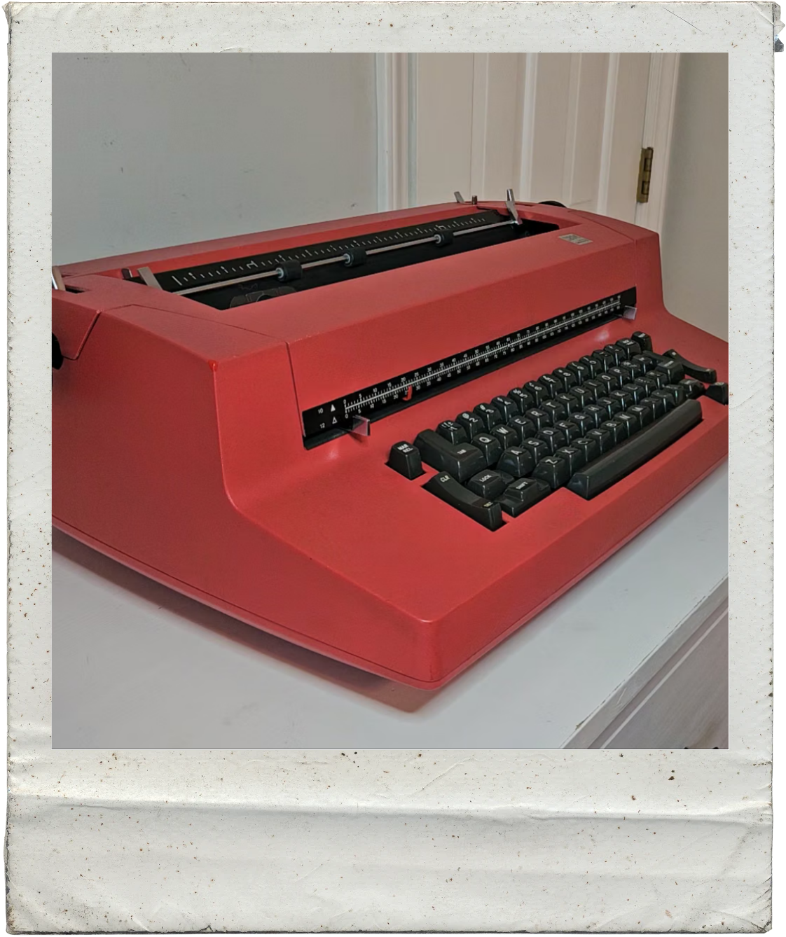 IBM Correcting Selectric II, red on white dresser