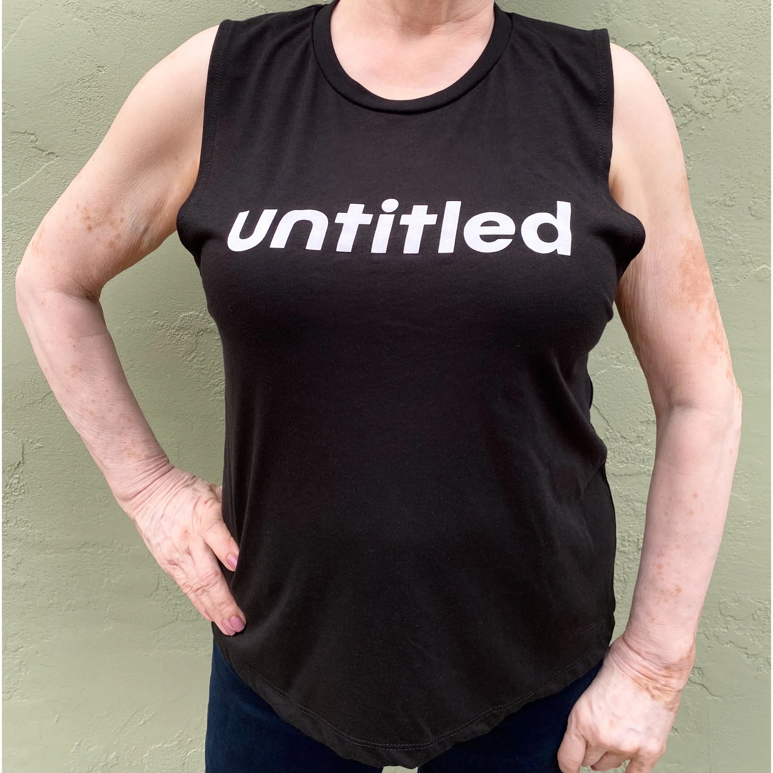 Martha-model-large-black-untitled-movement-muscle-tank-front-view.jpeg