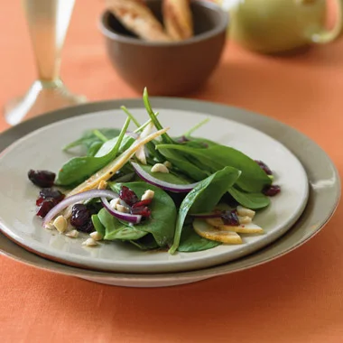 Spinach_Salad_with_Bosc_Pears_Cranberries_Red_Onion_and_Toasted_Hazelnuts.jpg