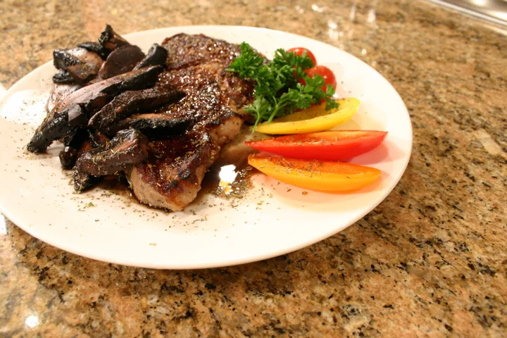 Grilled_Rib_Eye_Steak_with_Portobello_Mushrooms.jpg