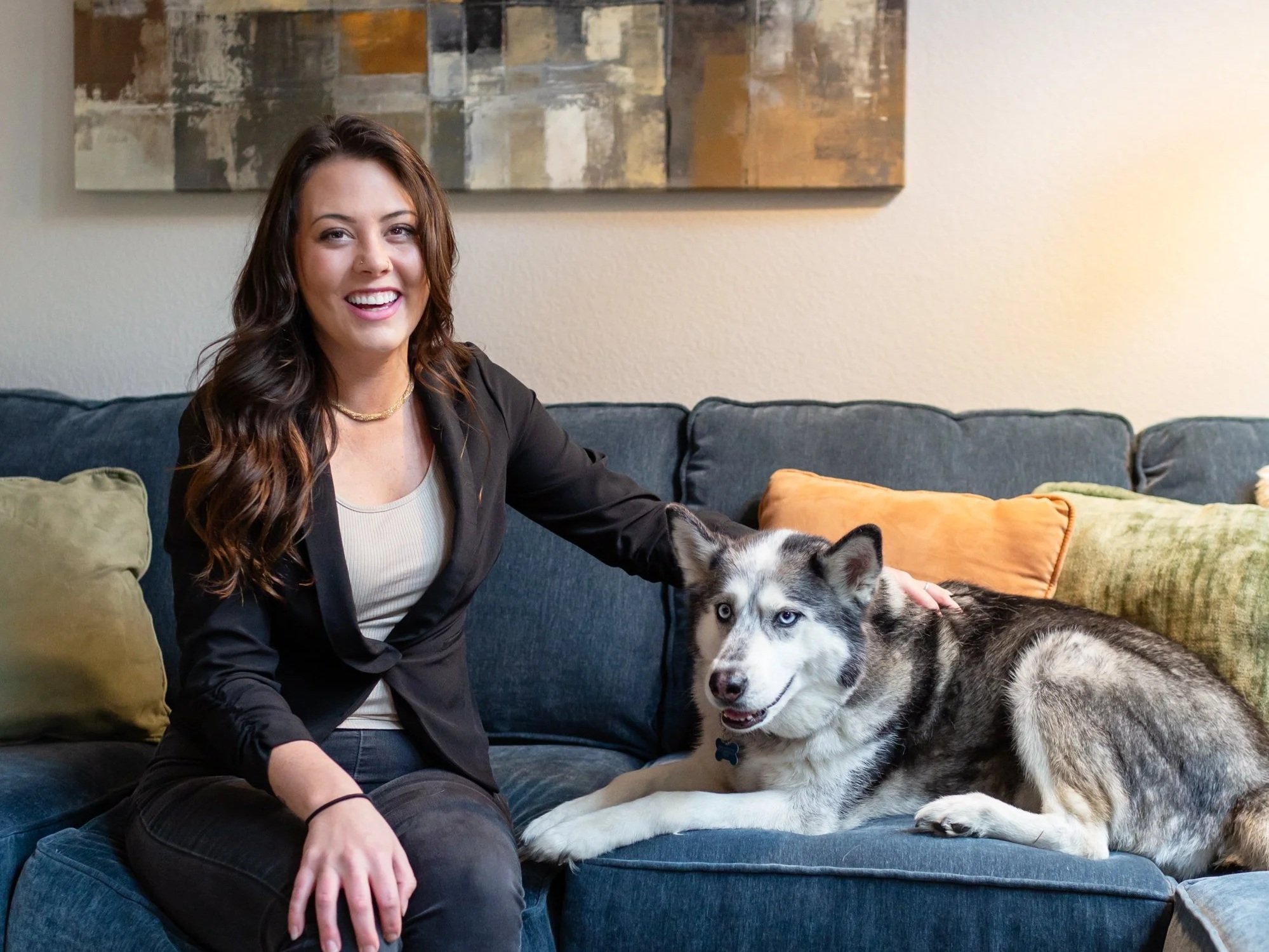 A portrait of April Stites with her dog.