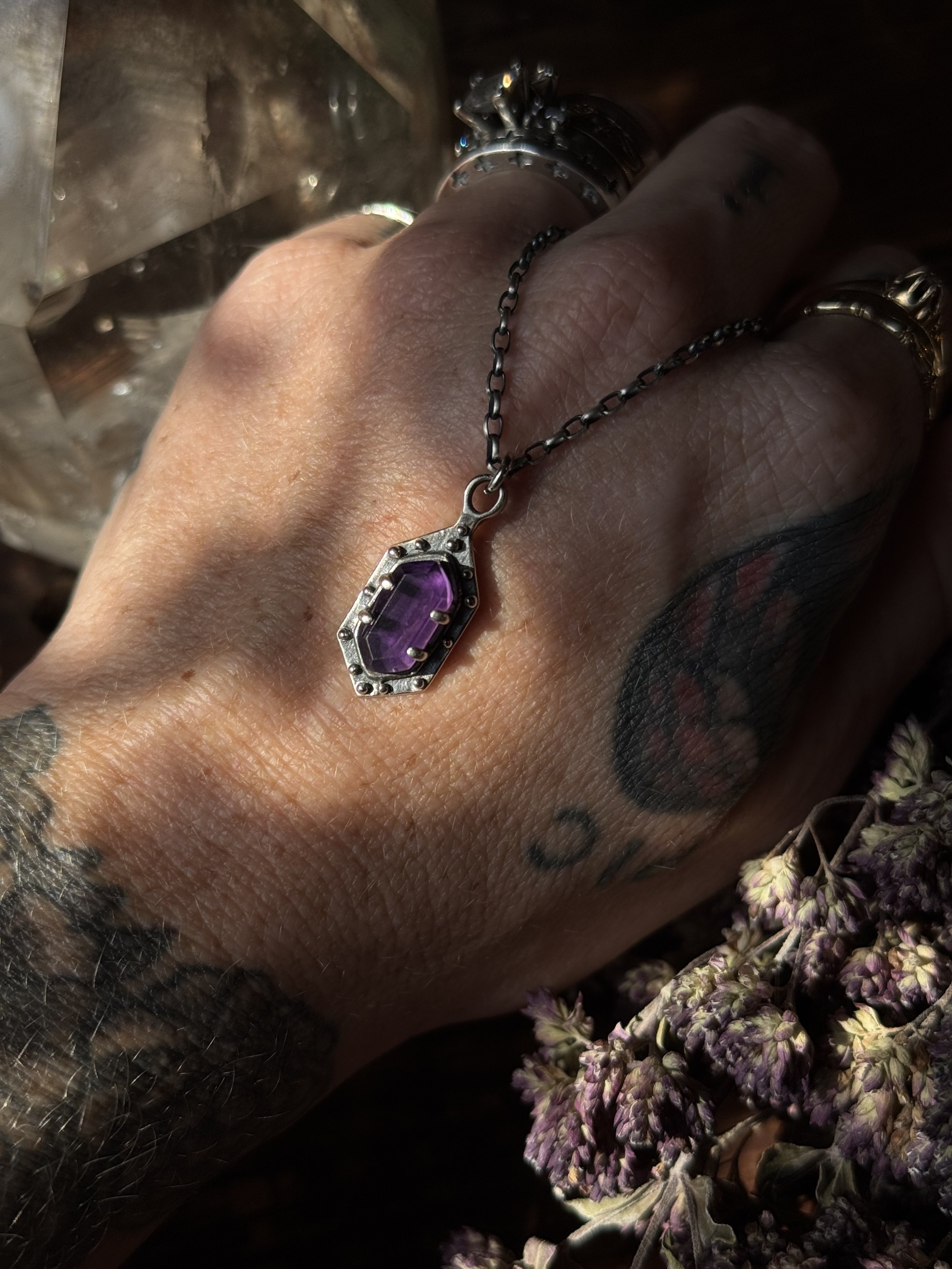 Maiden SHield Hex Necklace from Acid Queen with an amethyst stone, all made in sterling silver.