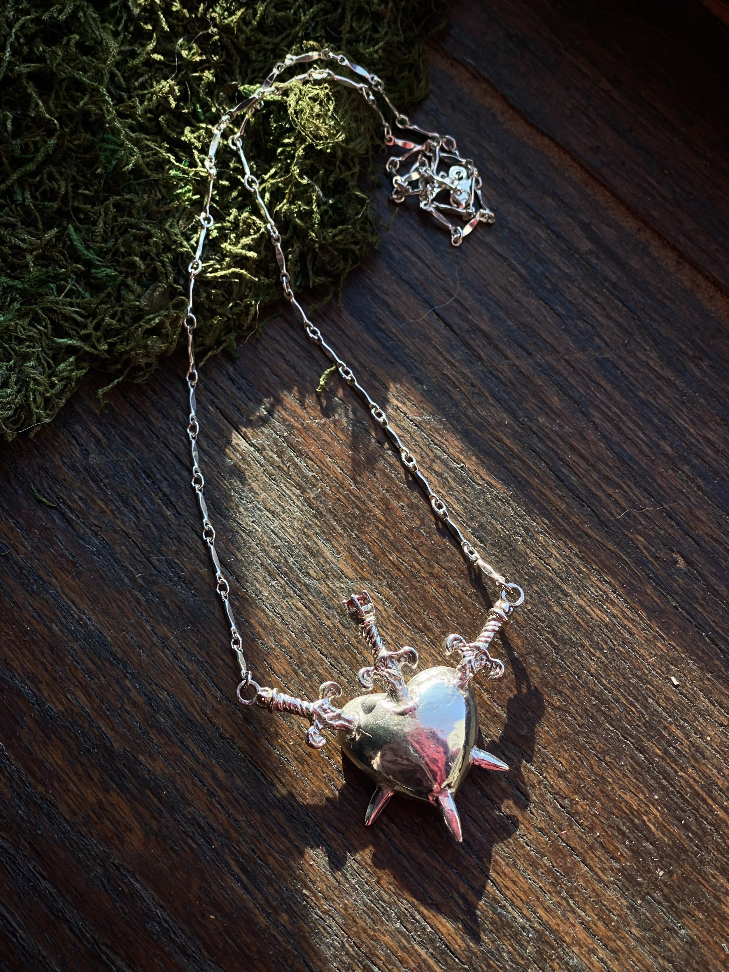 Sterling Silver Three of swords necklace by ozma adornments