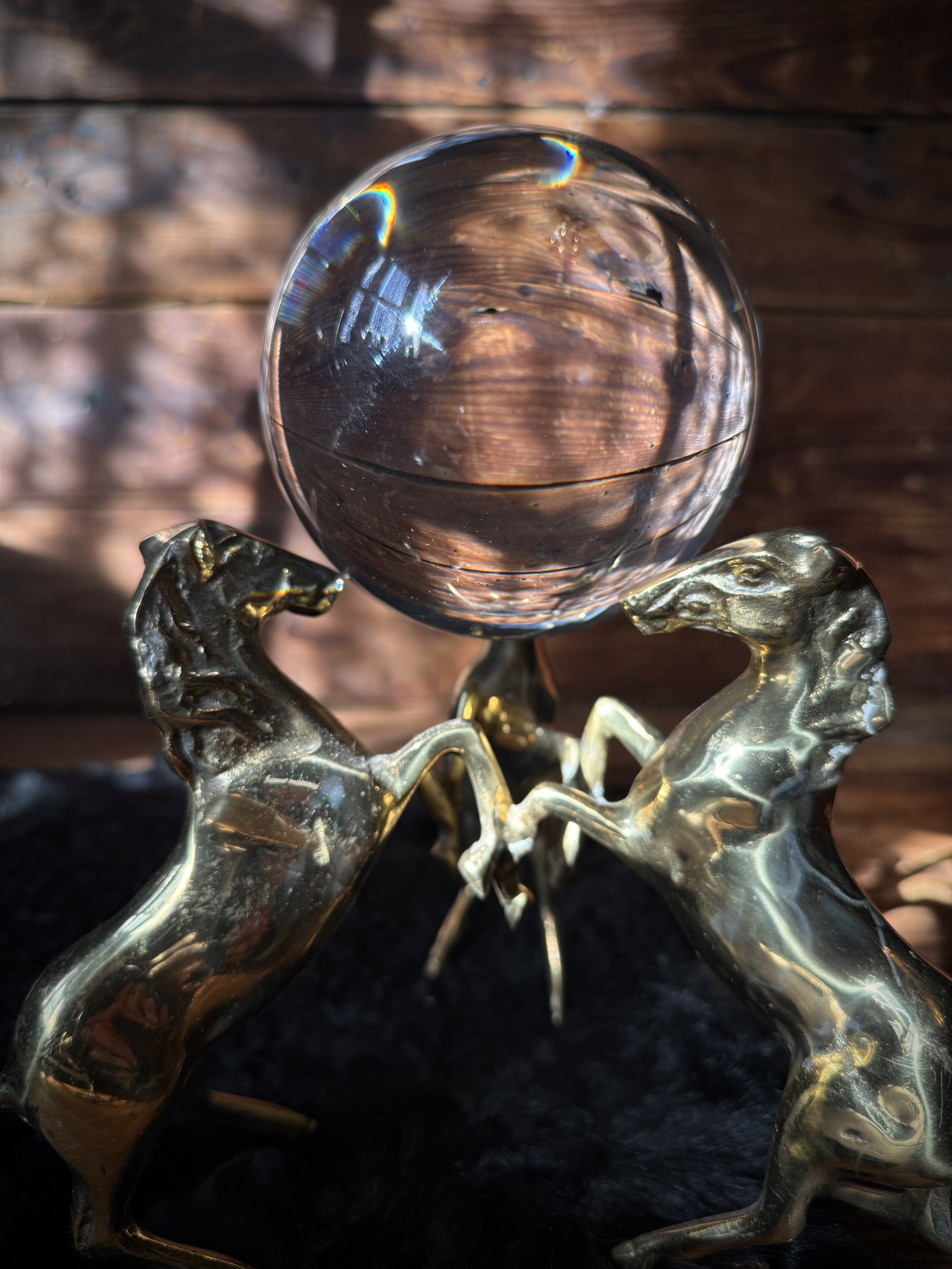 antique brass, highly detail three horse base with a crystal ball