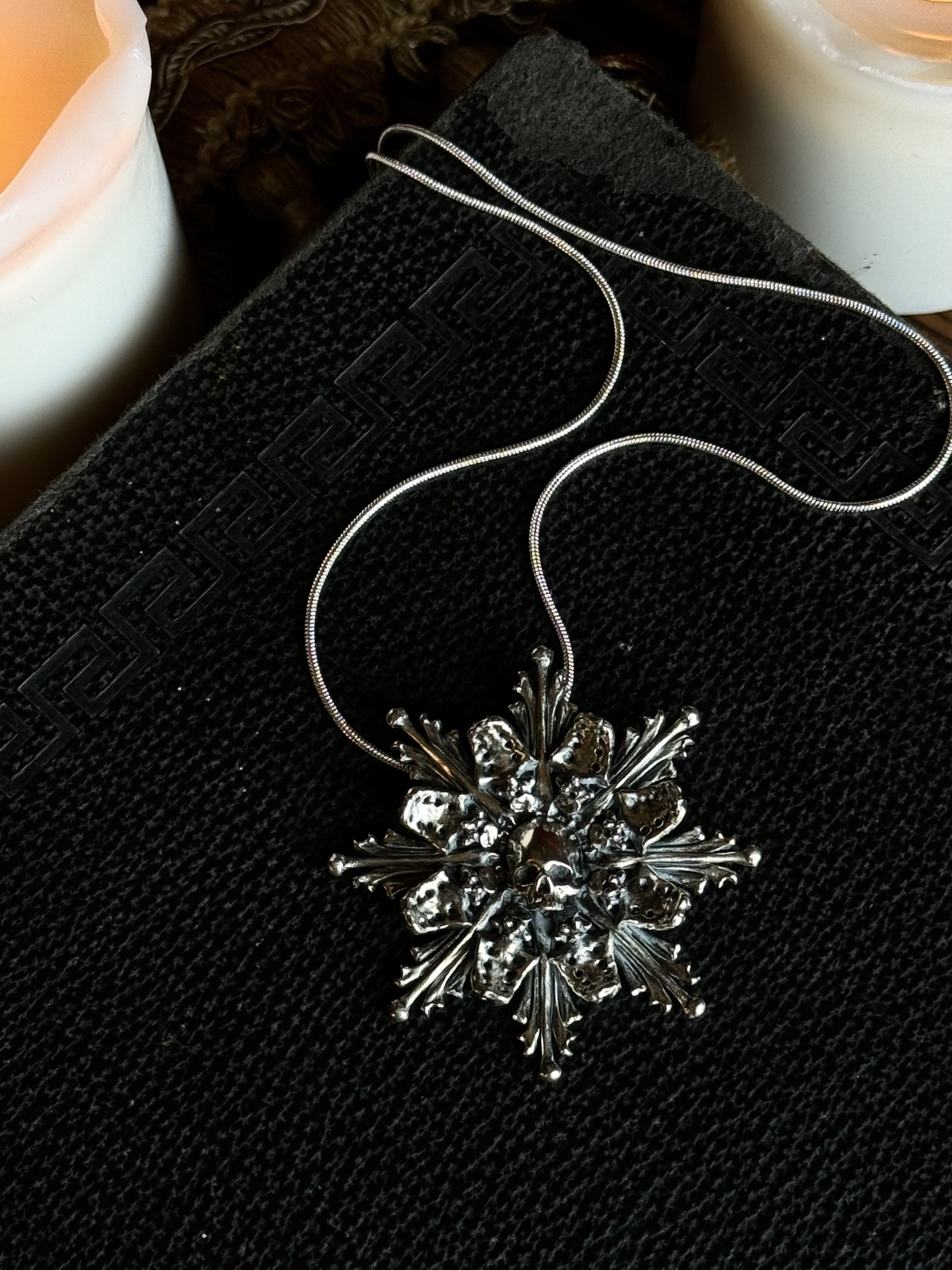 Sterling silver catacomb pendant necklace.