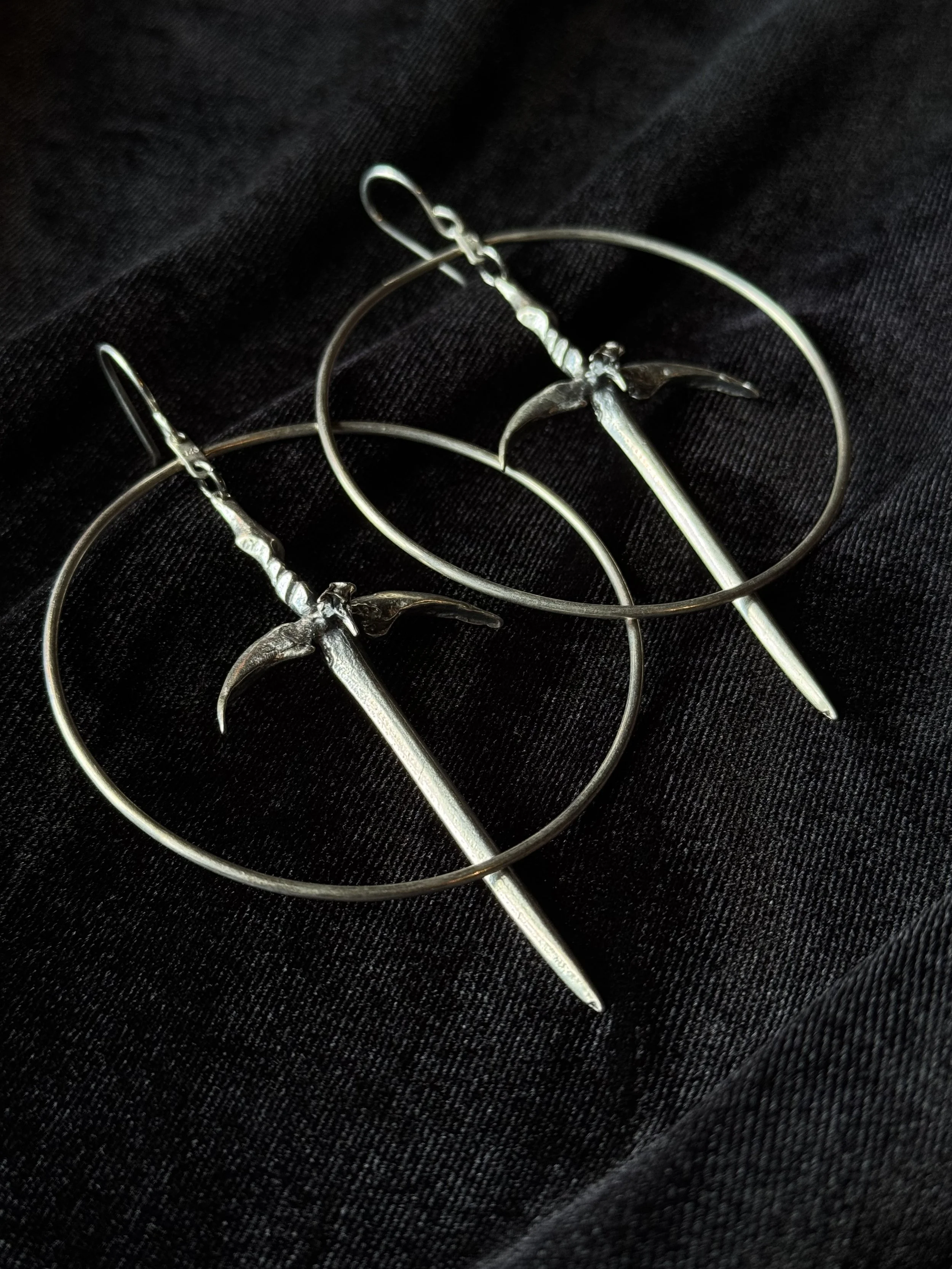 Sterling silver dagger and hoop earrings by Acid Queen Jewelry