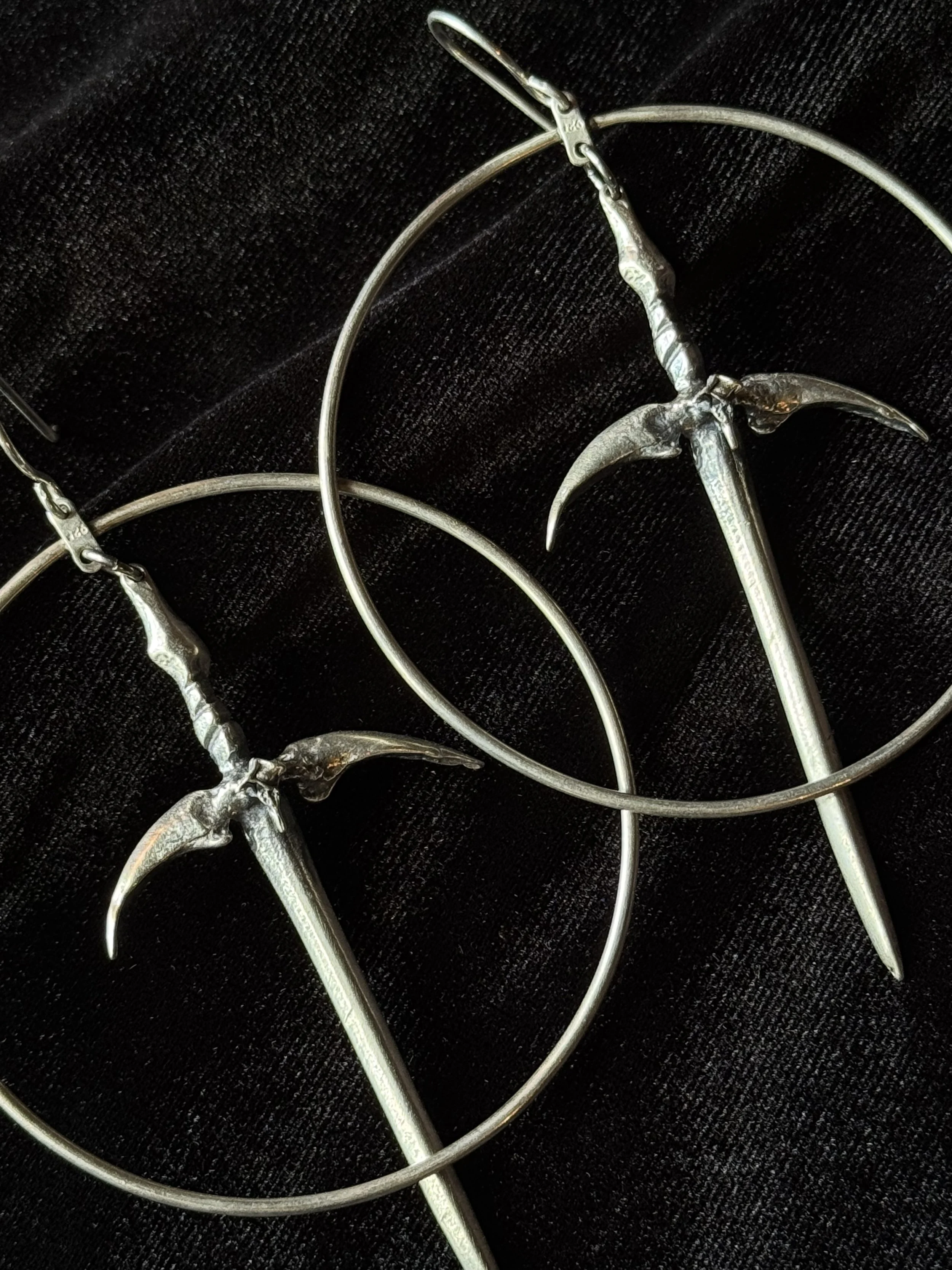 Sterling silver dagger and hoop earrings by Acid Queen Jewelry
