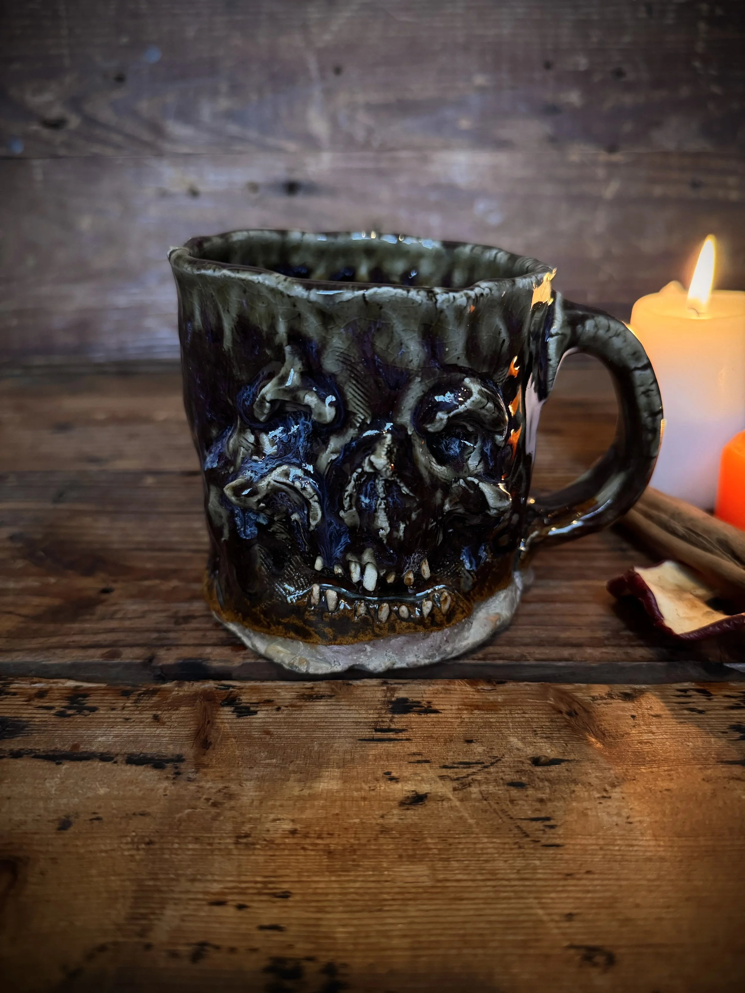 hand sculpted, multi-layer glazed skull mug