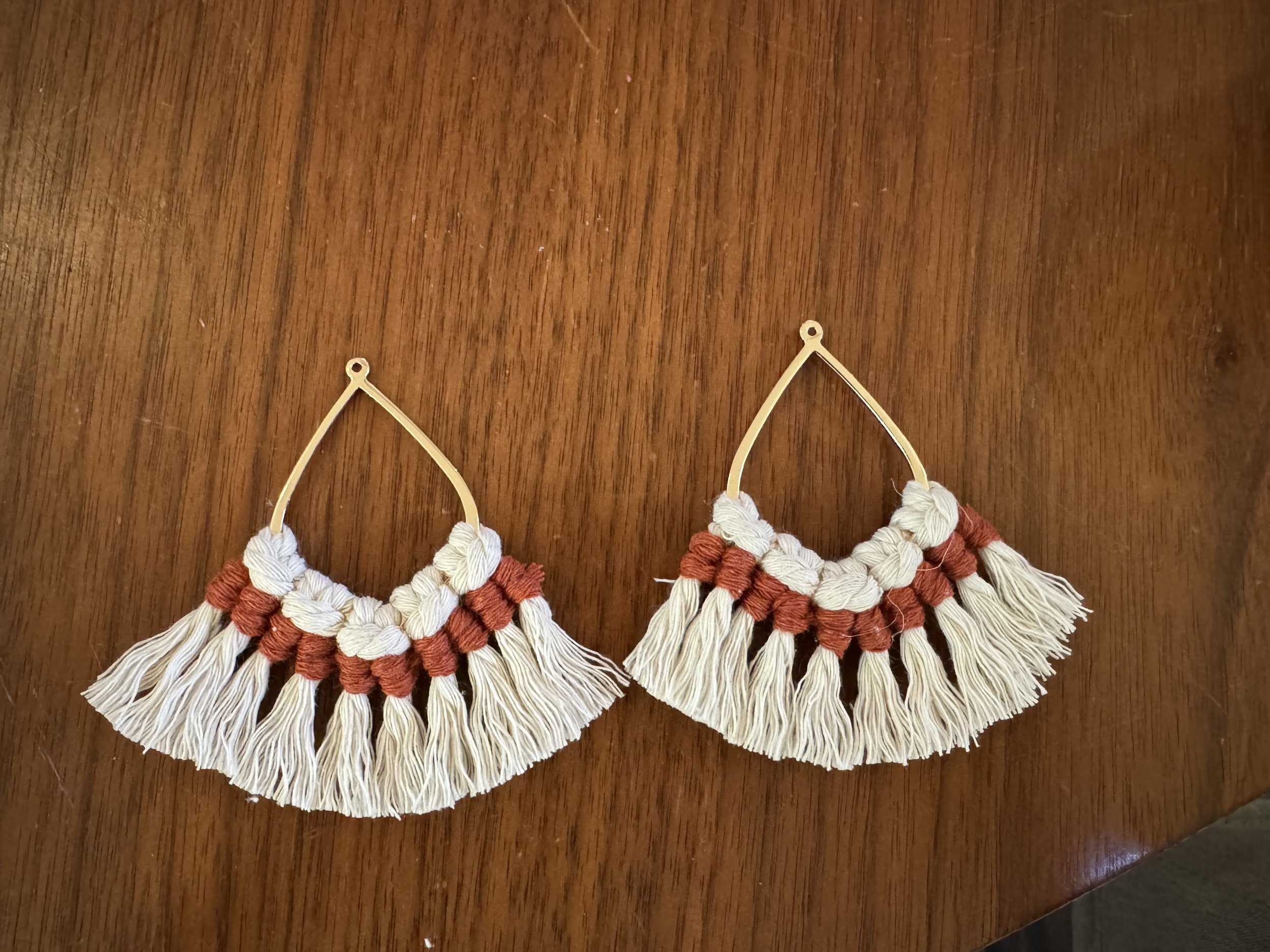 Gold macrame earrings with white and rust cord