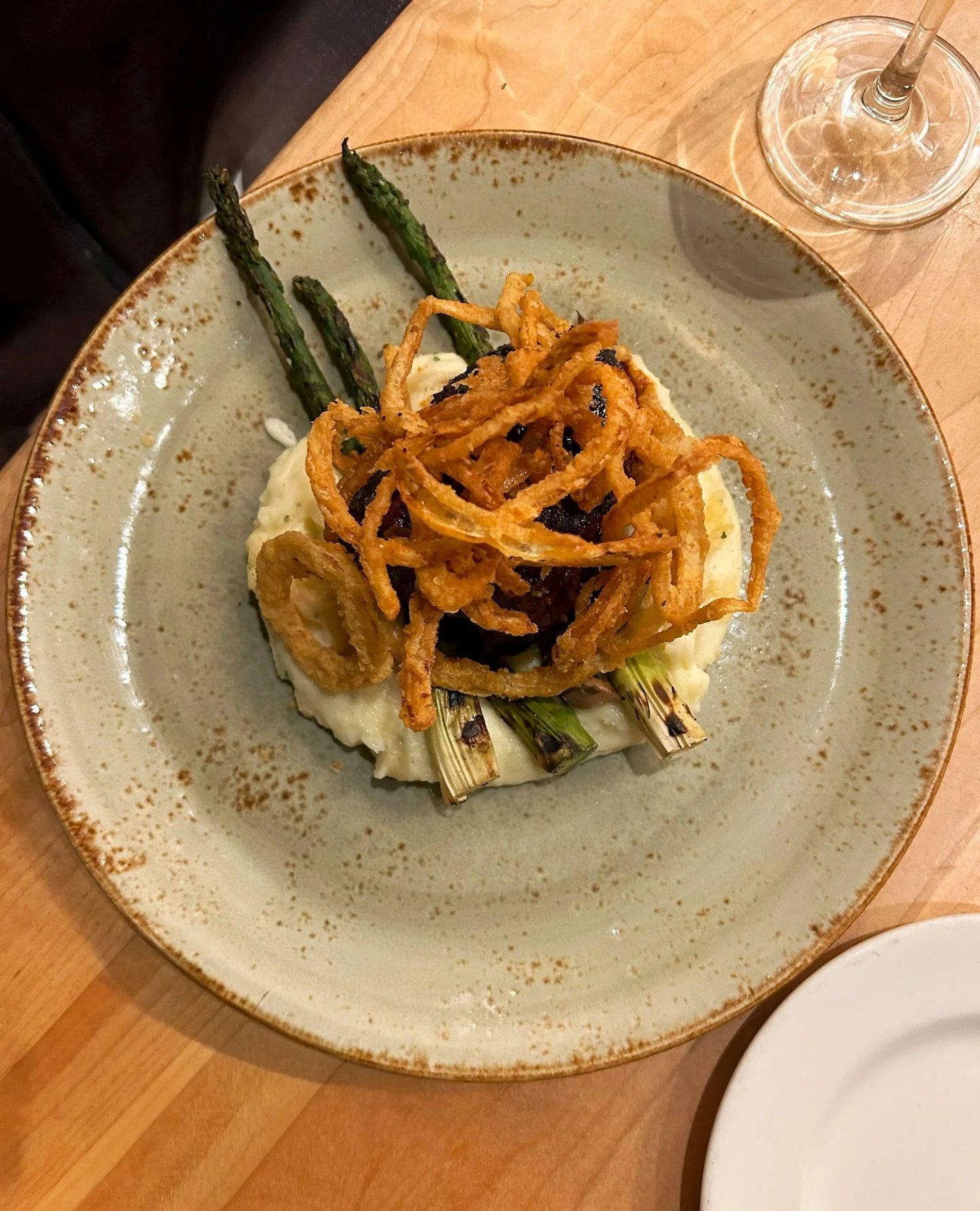 This hickory wood-fired filet is our best seller for a reason! 🥇

The Belle is served with a a red wine-balsamic glaze, creamy whipped potatoes, crispy fried onions, and grilled asparagus.

#hickorywoodfired #steaknashville #downtownnashville