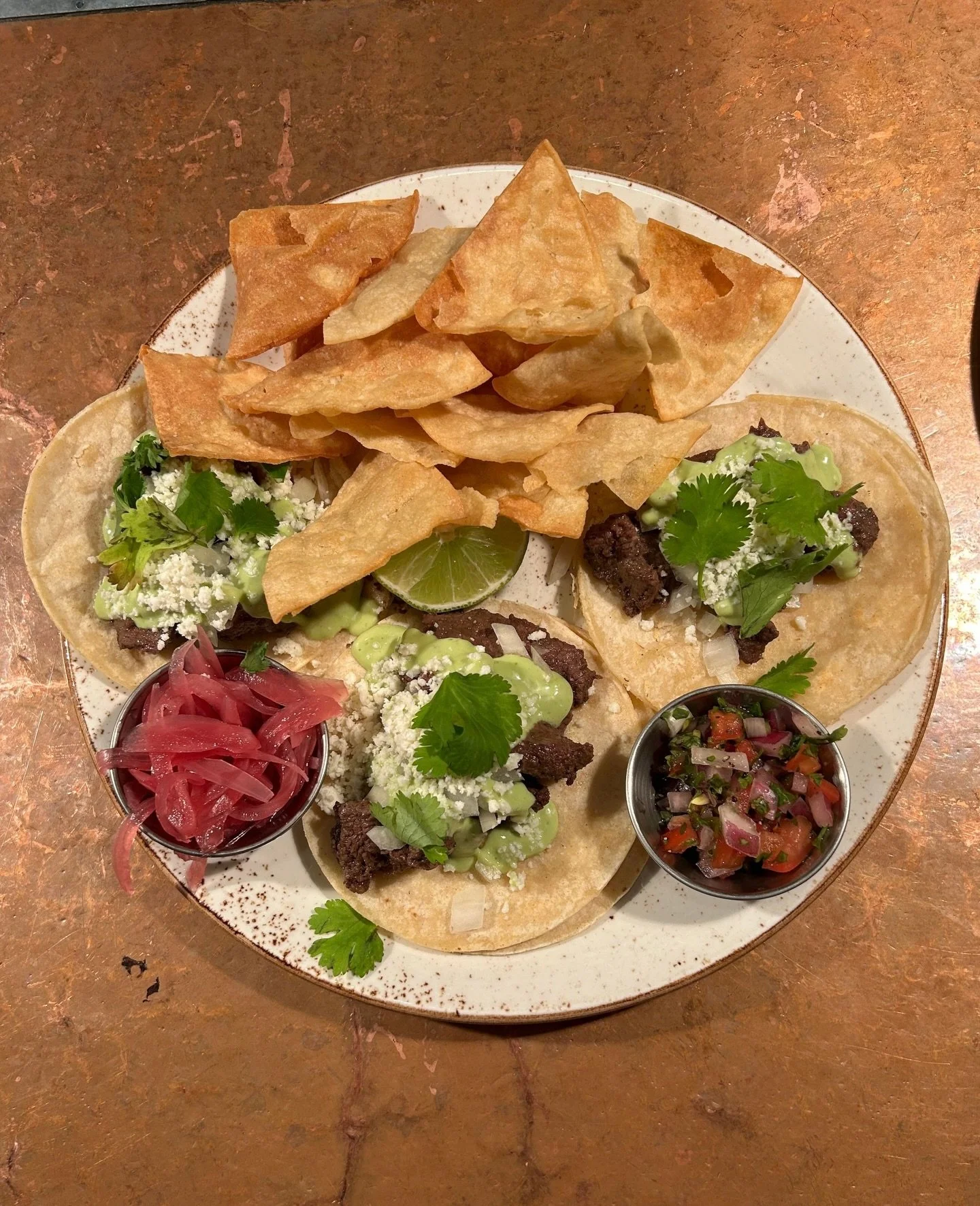 You&rsquo;re always south of somewhere when you get the Down South Tacos!⁠
⁠
Made with hickory wood-fired filet tenderloin carne asada on corn tortillas and served with house made avocado crema and queso fresco.⁠
⁠
#hickorywoodfired #downtownnashvill