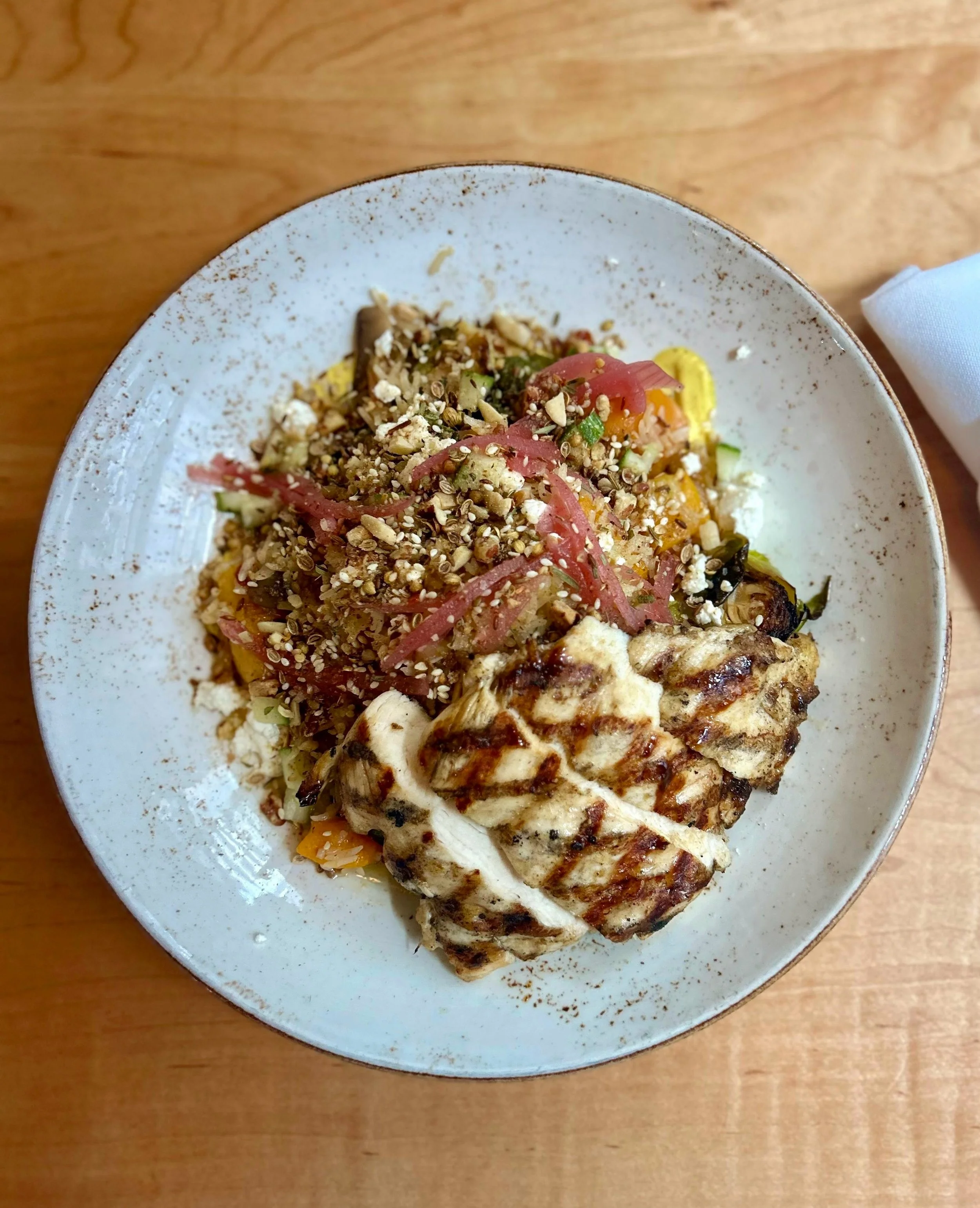 The Basmati Bowl is the perfect business lunch. ⁠
⁠
Made with⁠ basmati rice, tons of roasted veggies, goat cheese, seasonal dukkah, curry yogurt, &amp; citrus honey vinaigrette. Top if off with hickory grilled chicken, shrimp, or fish.⁠
⁠
#nashvillel