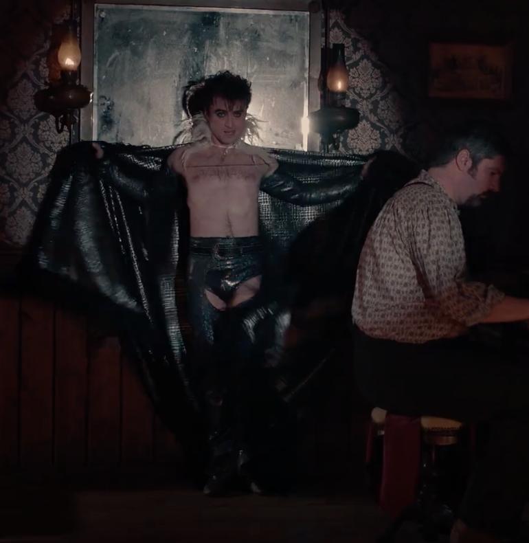 Exclusive: Watch a shirtless Daniel Radcliffe slay a vogue remix of 'She'll Be Coming Round the Mountain'