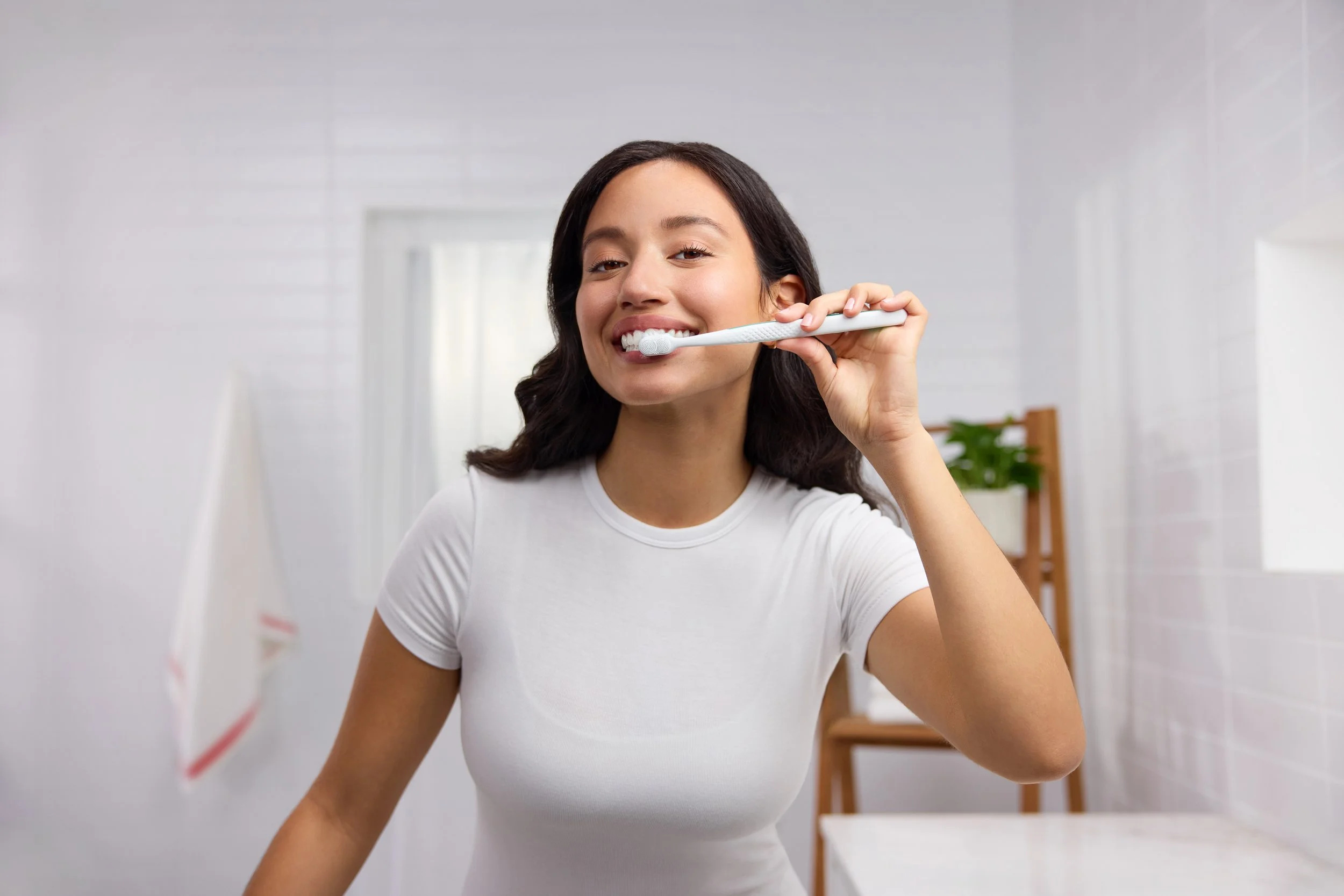 CA_Lifestyle_BR1_Brushing_Teeth_Looking_At_Camera_1102-(1).jpg