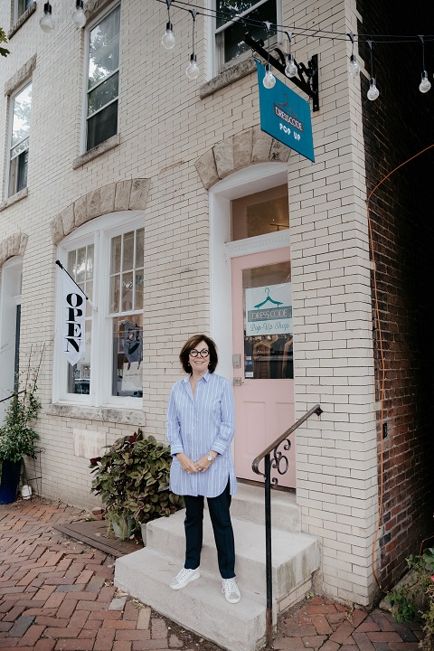 Dresscode opted for a window sign on our door and a hanging sign from our existing sign bracket. And, there’s our flag! (photo by our social media manager, Macey Kraus)