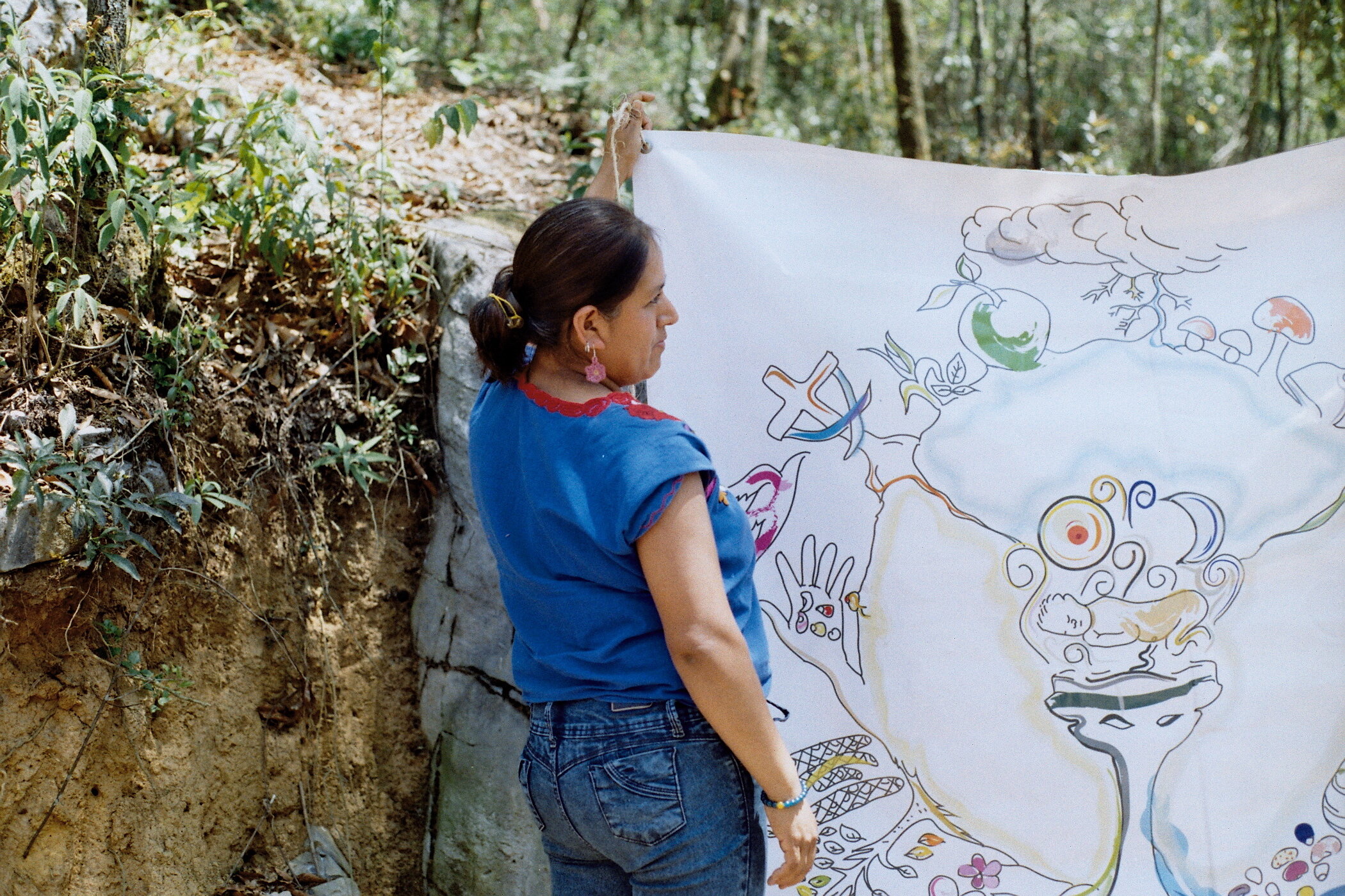 Woman displaying mural