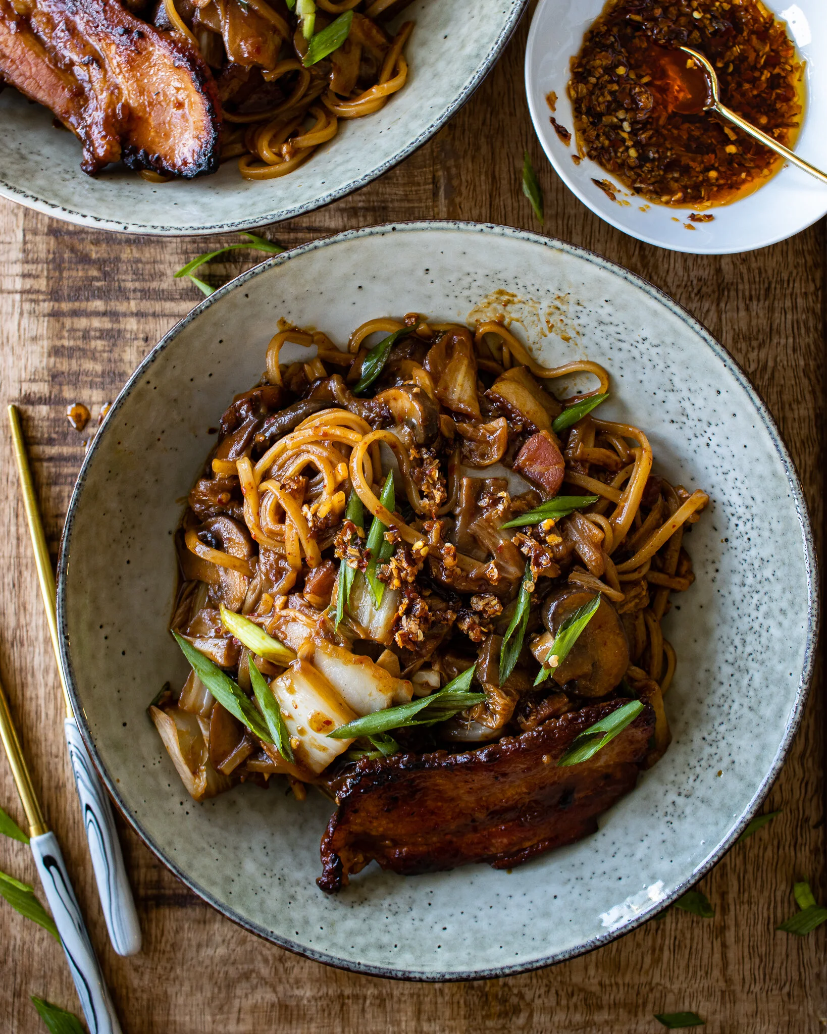 Chili crisp noodles with pan fried pork belly — Inspired With A Twist