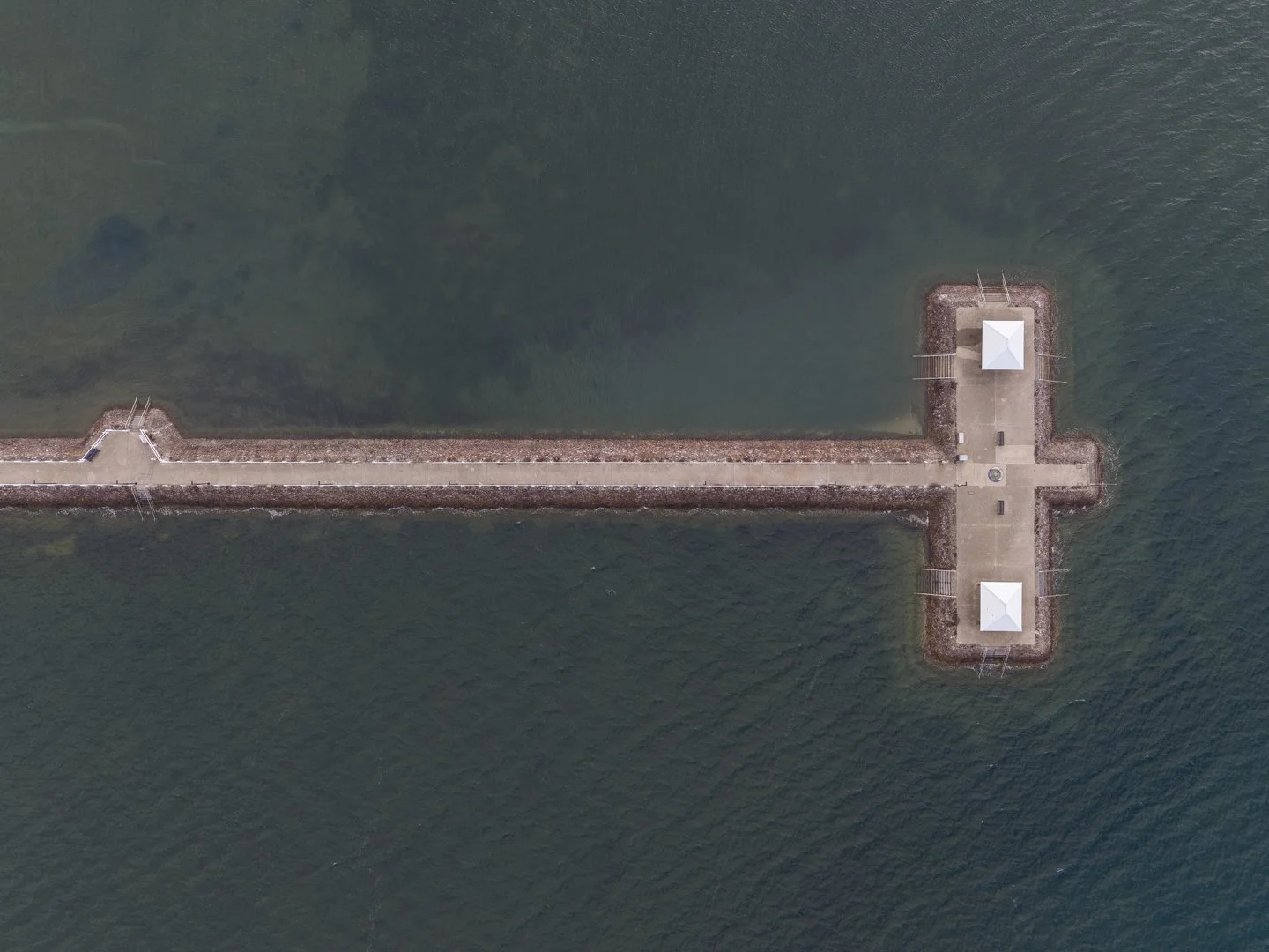 Aerial top-down view of Wynnum jetty extending into Moreton Bay — captured by Digital 1 QLD drone photography services, Brisbane East and Redlands