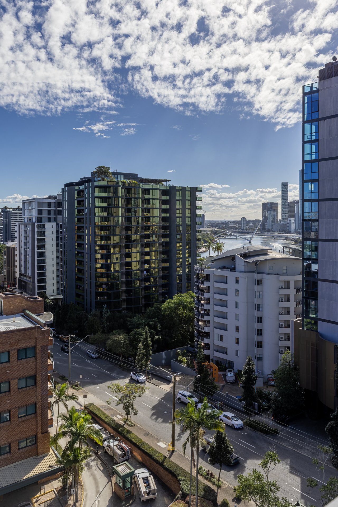 Aerial view of South Brisbane apartment buildings with Brisbane River and CBD skyline in the background — Digital 1 QLD