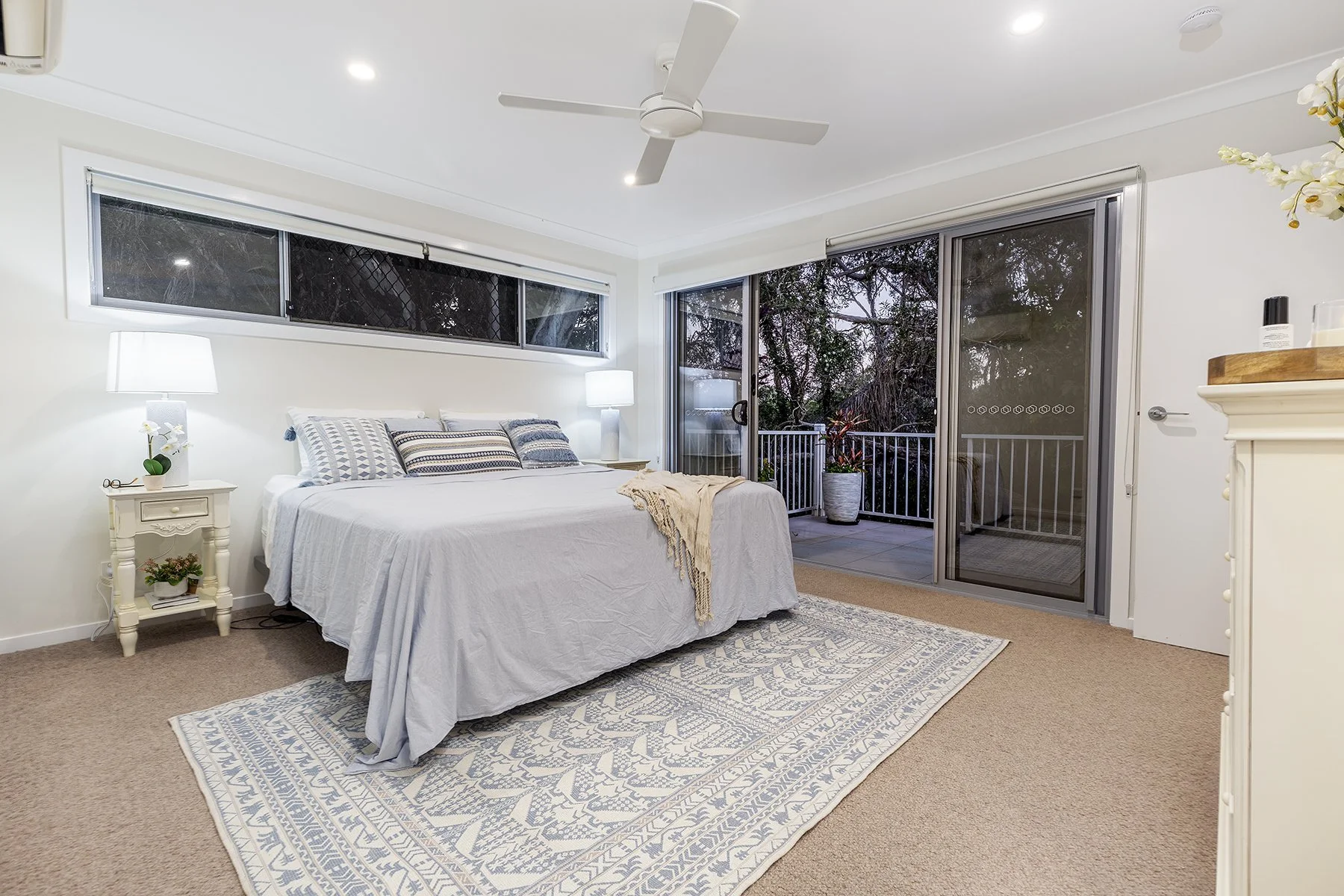 Professional property marketing photography showcasing a bright open-plan indoor outdoor living layout in Redland Bay Queensland
