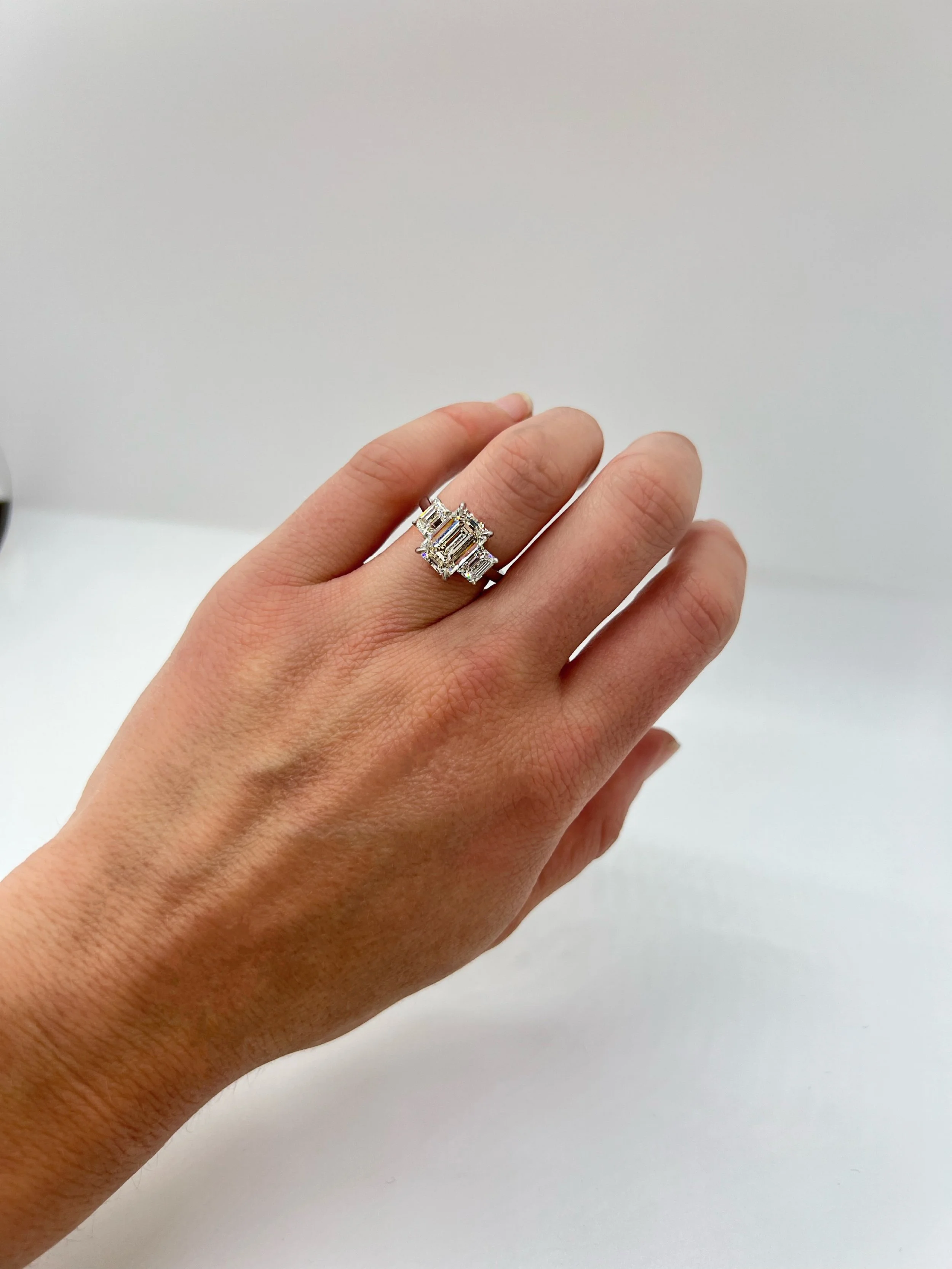 Three Stone Emerald Cut Diamond Ring