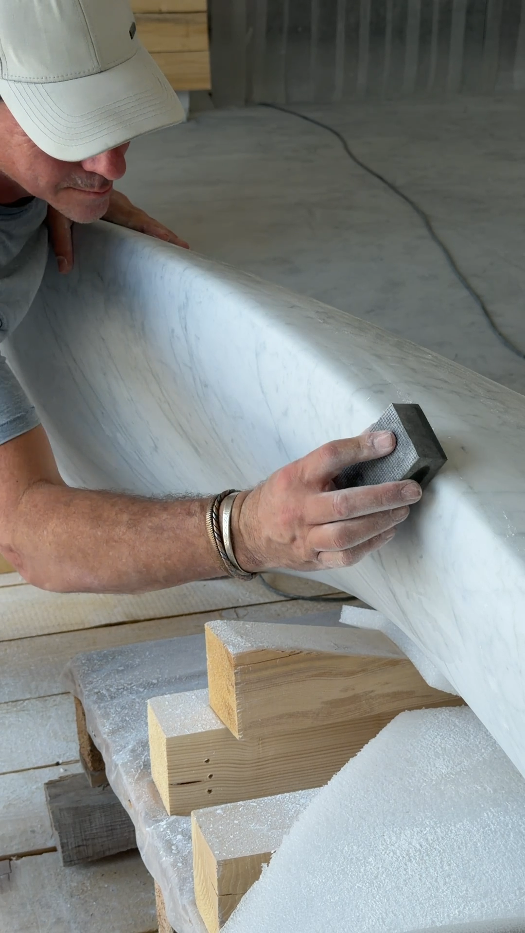 Dominic van der Merwe hand finishing a Carrara marble sculpture in Pietrasanta, Italy.
