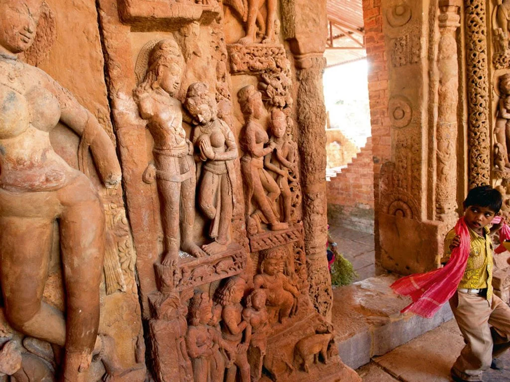 Carvings at the entrance of the double-storeyed Teevardev Vihara represent episodes from the Panchatantra, Buddha’s life, and activities like bullfighting and elephant breeding. Photo: Sanjay Austa